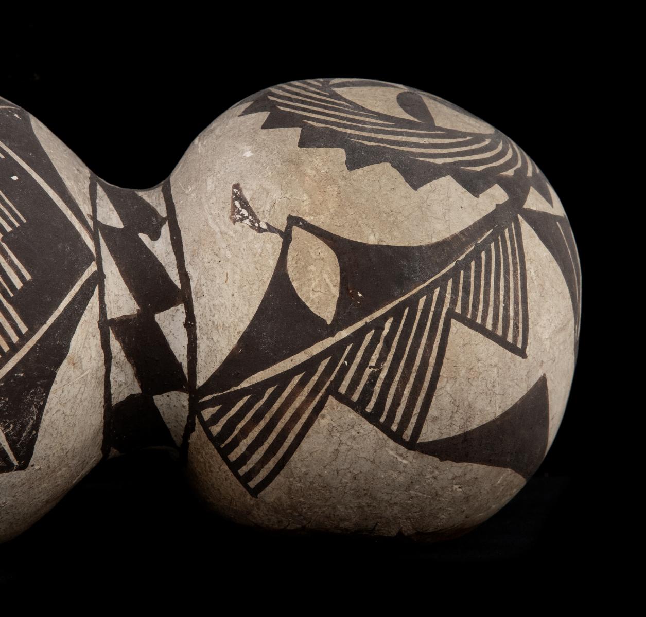 A 19TH CENTURY ACOMA TRI-LOBE PUEBLO POTTERY CANTEEN