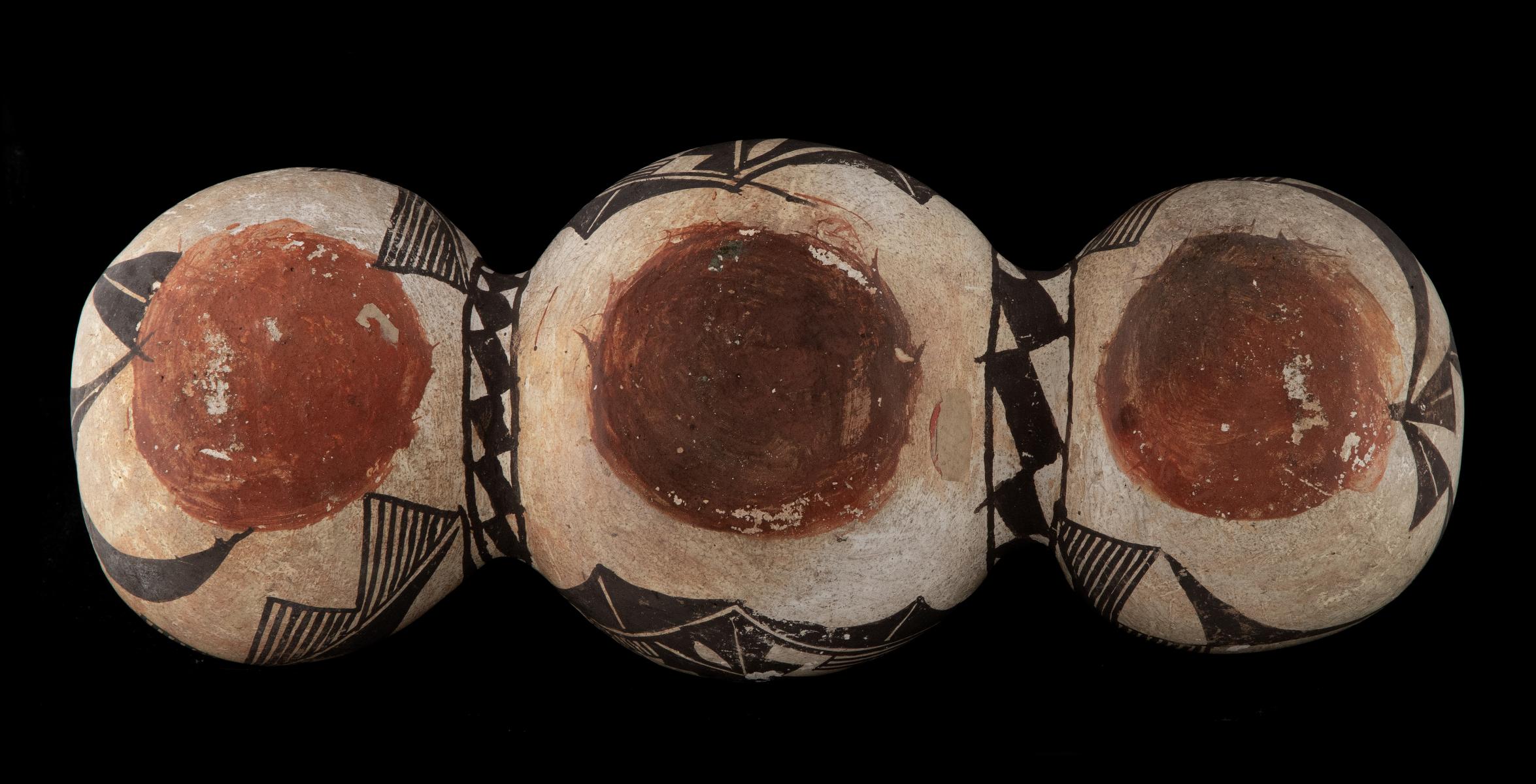 A 19TH CENTURY ACOMA TRI-LOBE PUEBLO POTTERY CANTEEN