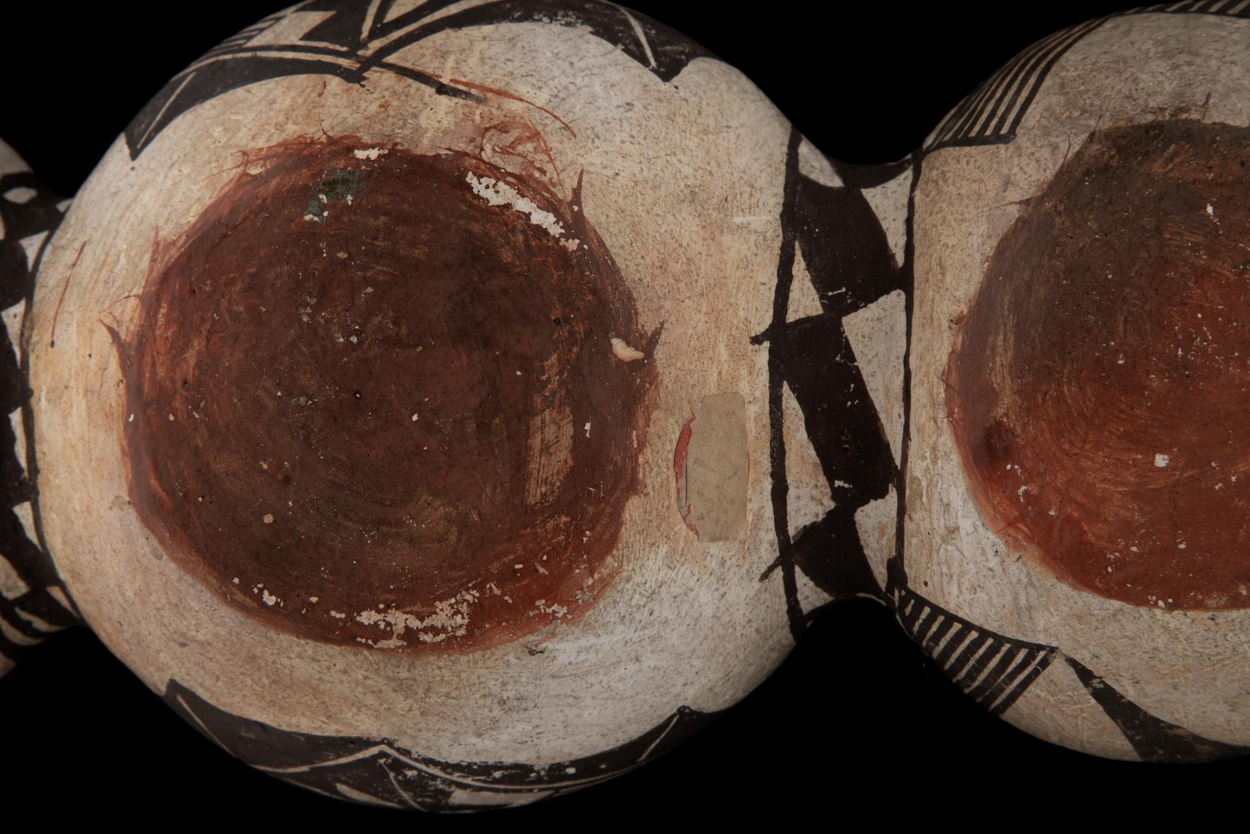 A 19TH CENTURY ACOMA TRI-LOBE PUEBLO POTTERY CANTEEN