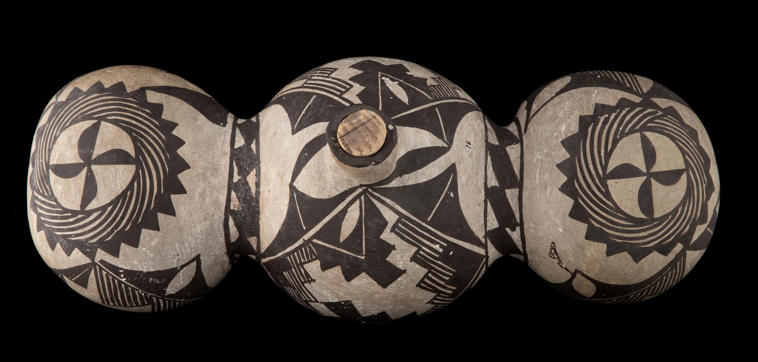 A 19TH CENTURY ACOMA TRI-LOBE PUEBLO POTTERY CANTEEN