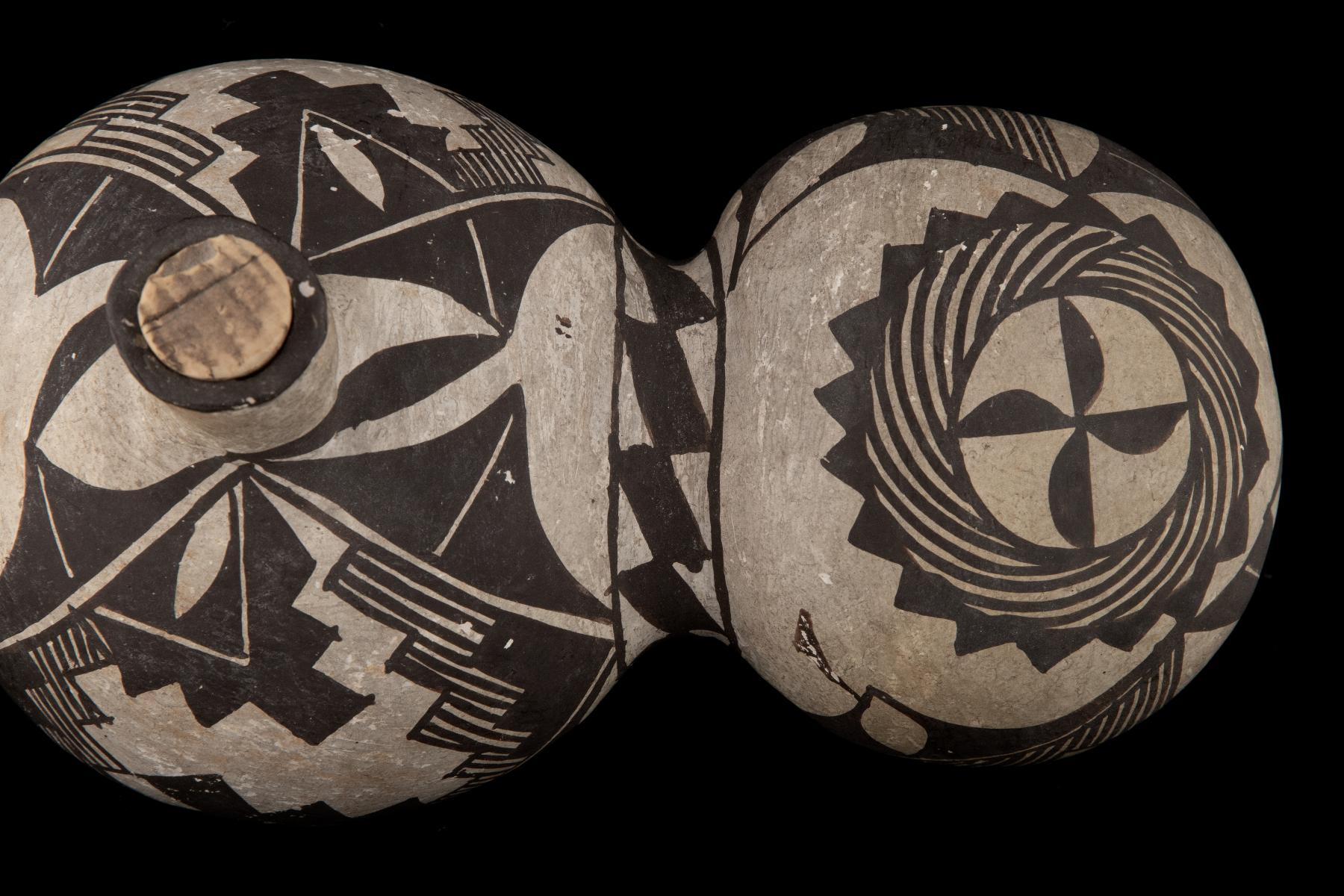 A 19TH CENTURY ACOMA TRI-LOBE PUEBLO POTTERY CANTEEN