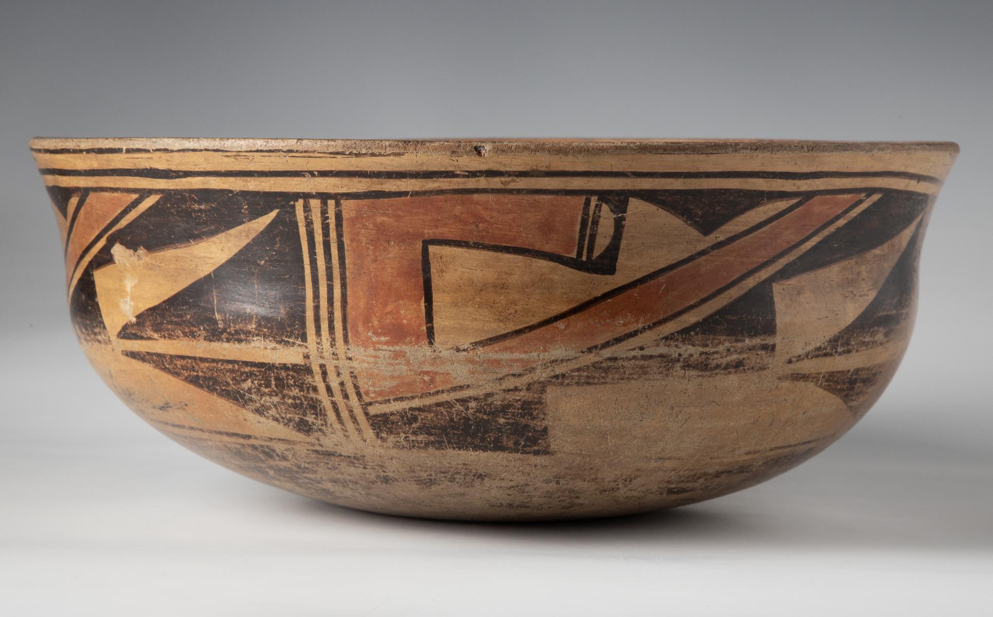 AN EARLY 20C. HOPI PUEBLO POTTERY BOWL OF UNUSUAL FORM