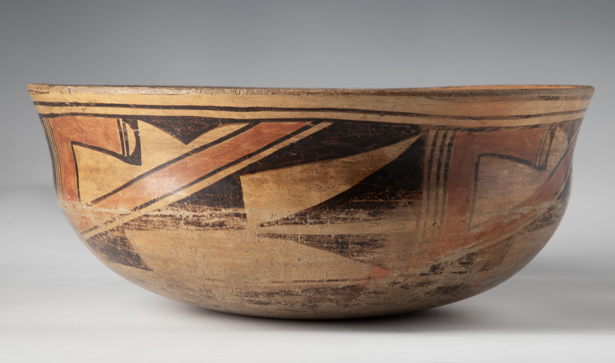AN EARLY 20C. HOPI PUEBLO POTTERY BOWL OF UNUSUAL FORM