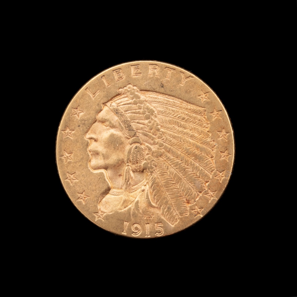 A 1915 $2.50 QUARTER EAGLE GOLD COIN