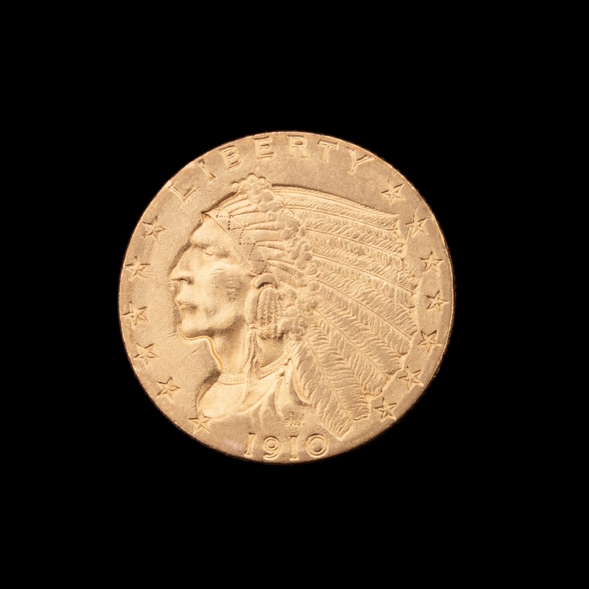 A 1910 $2.50 QUARTER EAGLE GOLD COIN