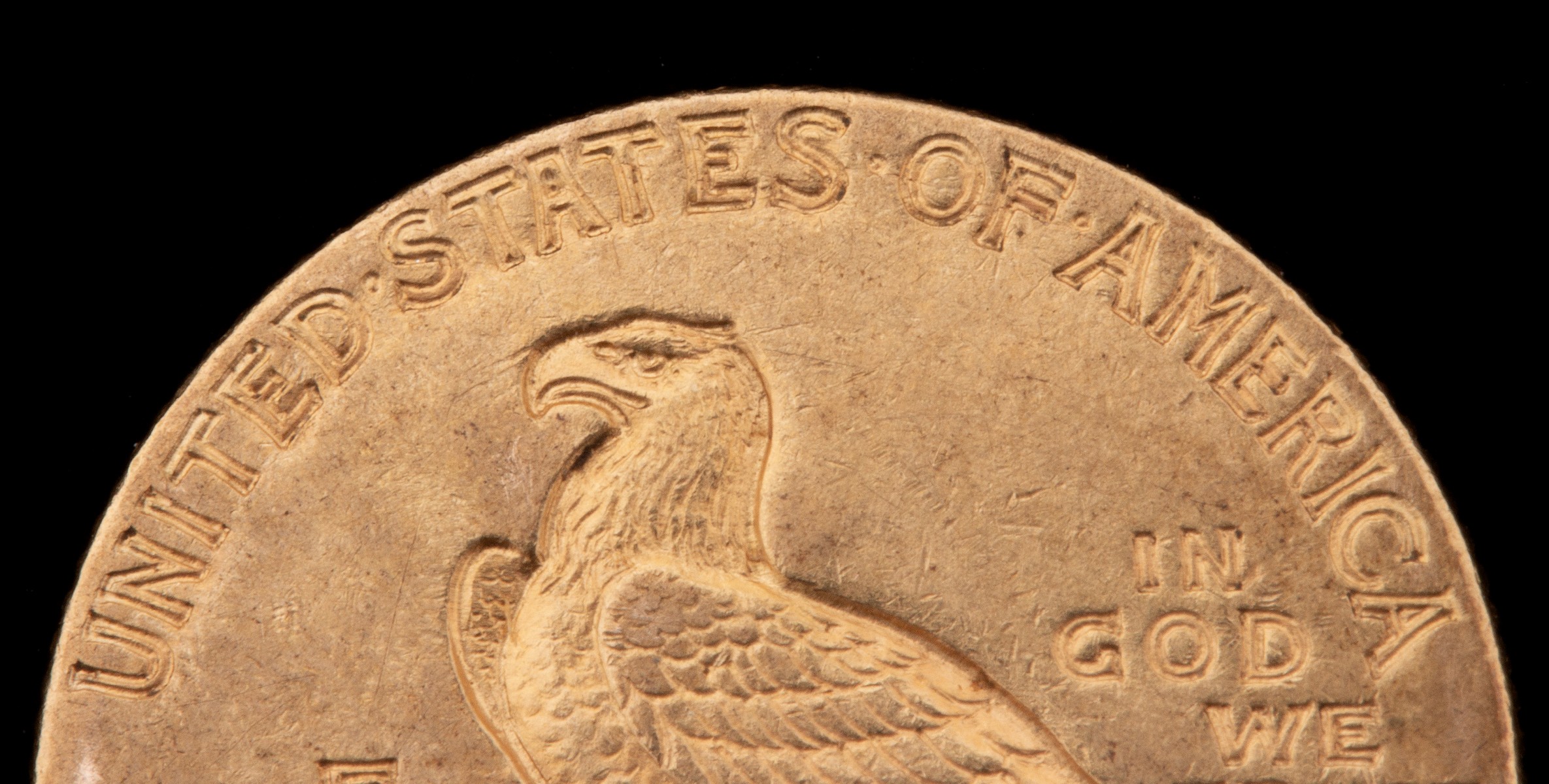 A 1910 $2.50 QUARTER EAGLE GOLD COIN