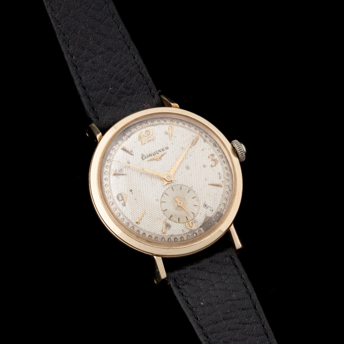 A 1950s LONGINES 14K GOLD GENT'S WRIST WATCH