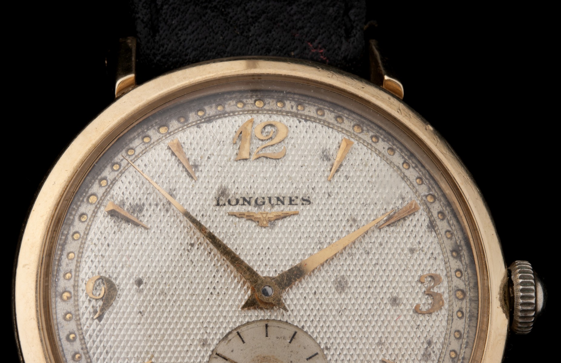 A 1950s LONGINES 14K GOLD GENT'S WRIST WATCH