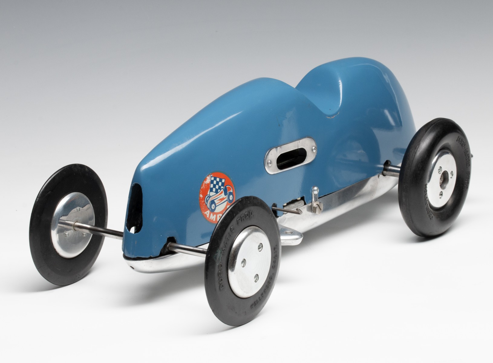 A DURO-MATIC 'INVADER' TETHER CAR WITH MCCOY REDHEAD