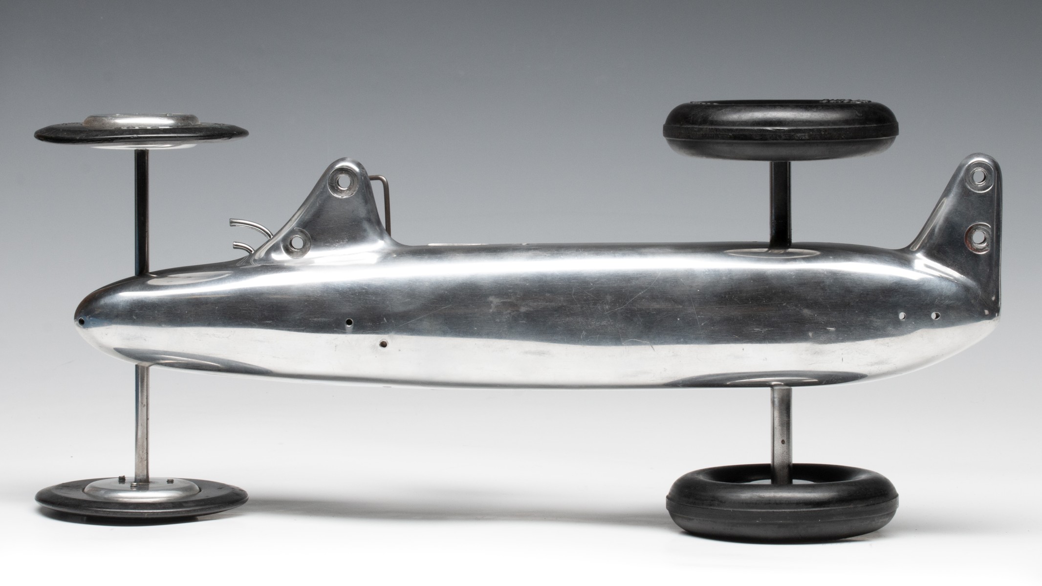 A DURO-MATIC 'INVADER' TETHER CAR WITH MCCOY REDHEAD