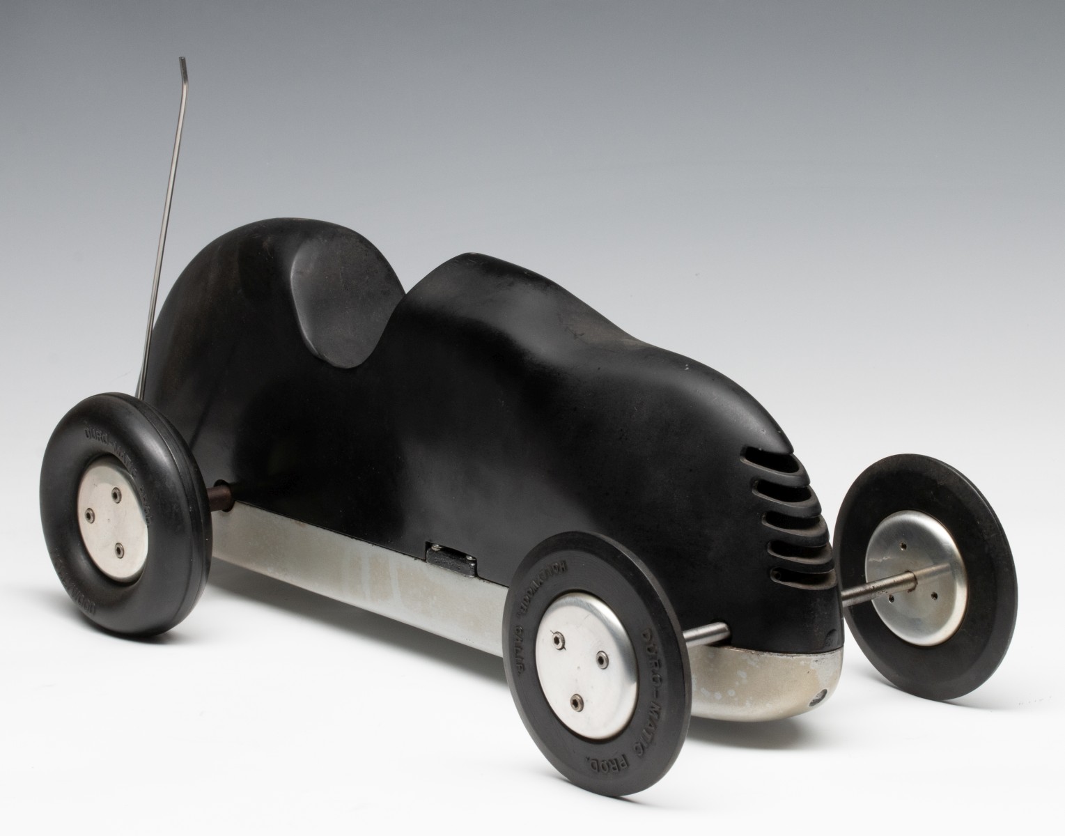 A DURO-MATIC 'INVADER' TETHER CAR WITH MCCOY REDHEAD