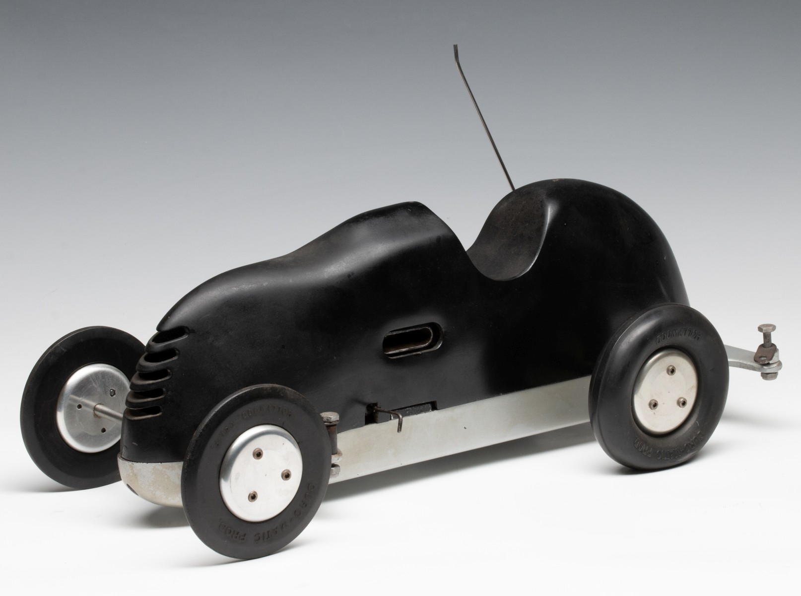 A DURO-MATIC 'INVADER' TETHER CAR WITH MCCOY REDHEAD