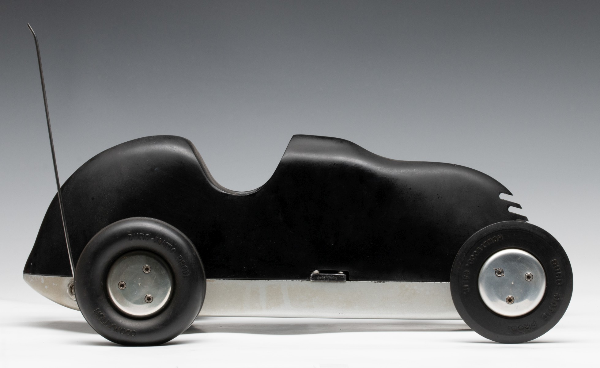 A DURO-MATIC 'INVADER' TETHER CAR WITH MCCOY REDHEAD