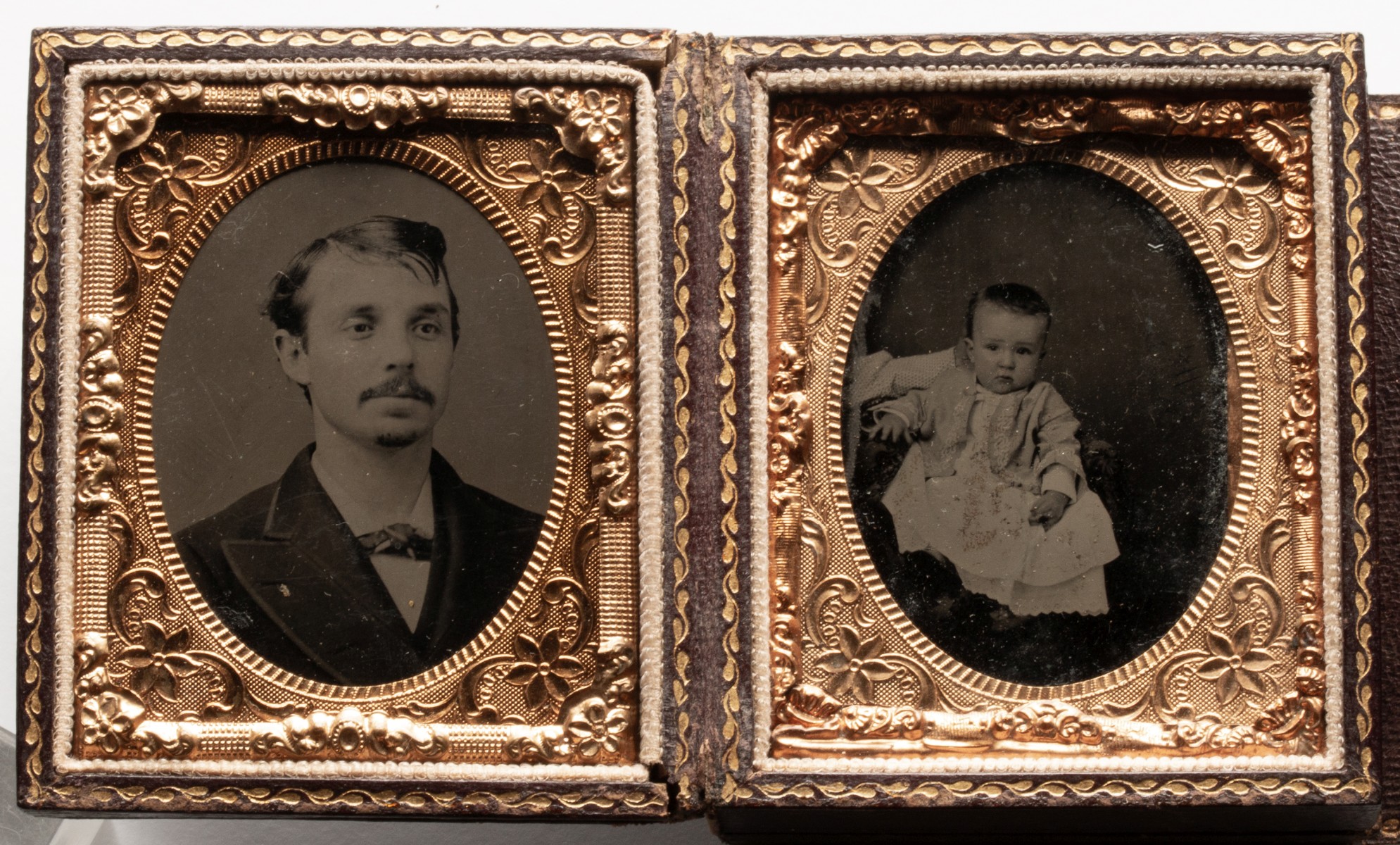 AN UNUSUAL LEATHER CASE WITH TINTYPES AND DAGUERREOTYPE