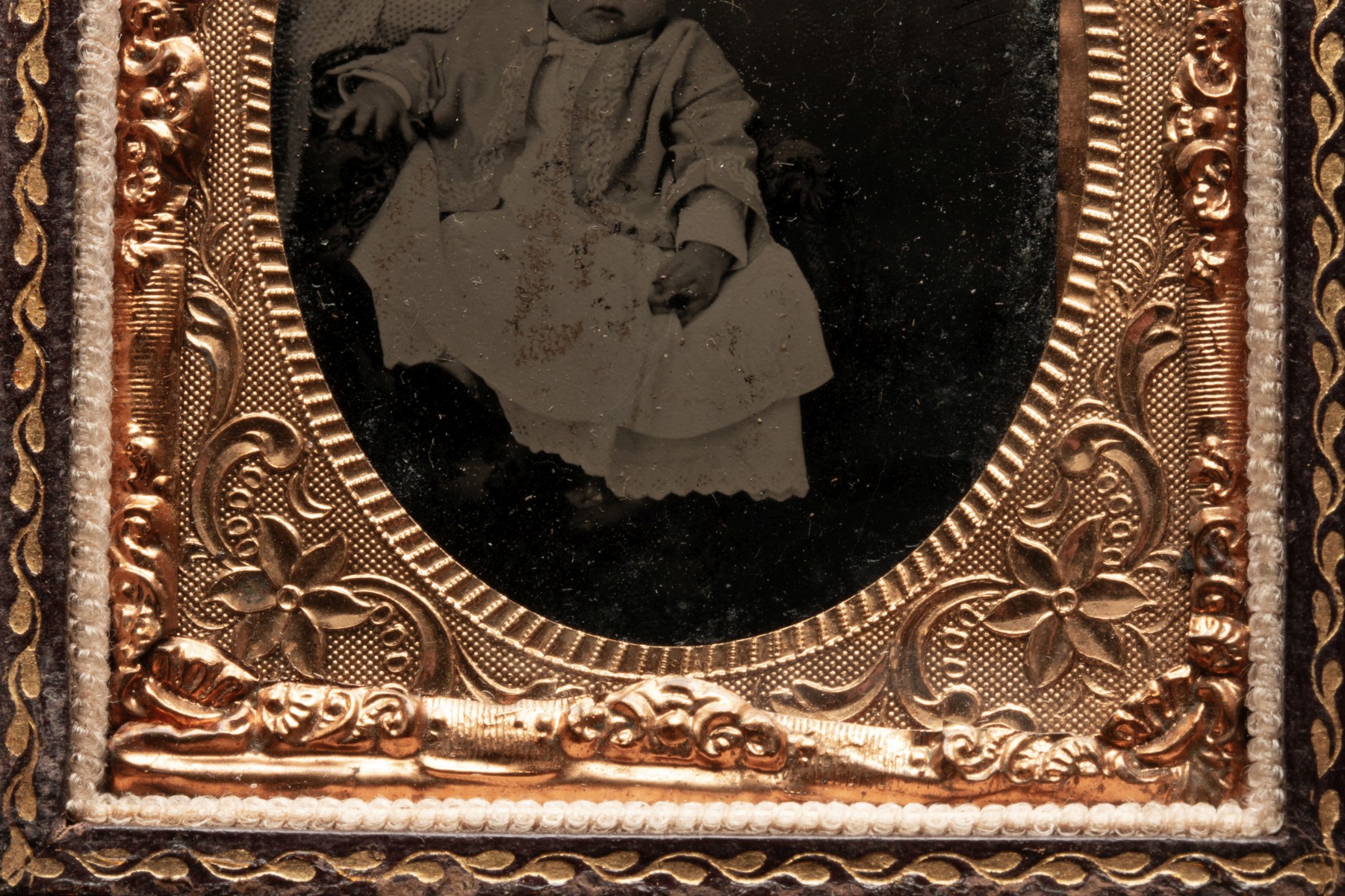 AN UNUSUAL LEATHER CASE WITH TINTYPES AND DAGUERREOTYPE