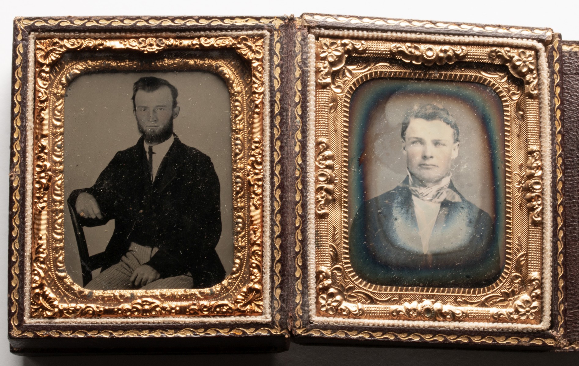 AN UNUSUAL LEATHER CASE WITH TINTYPES AND DAGUERREOTYPE