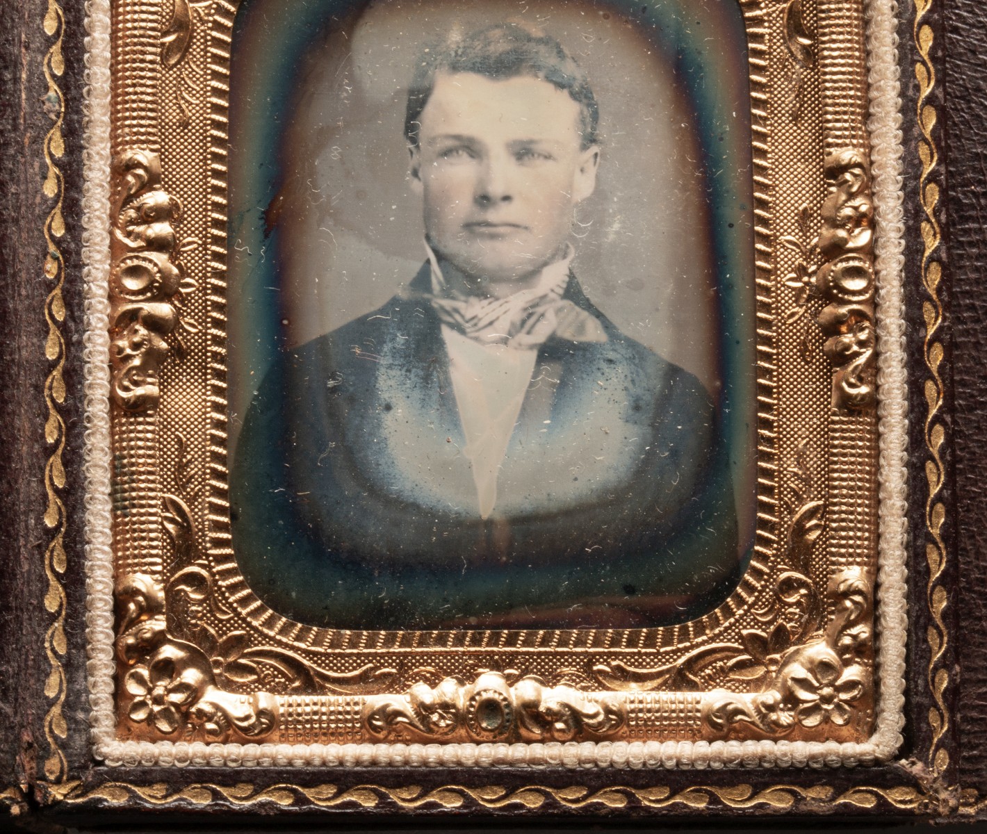 AN UNUSUAL LEATHER CASE WITH TINTYPES AND DAGUERREOTYPE