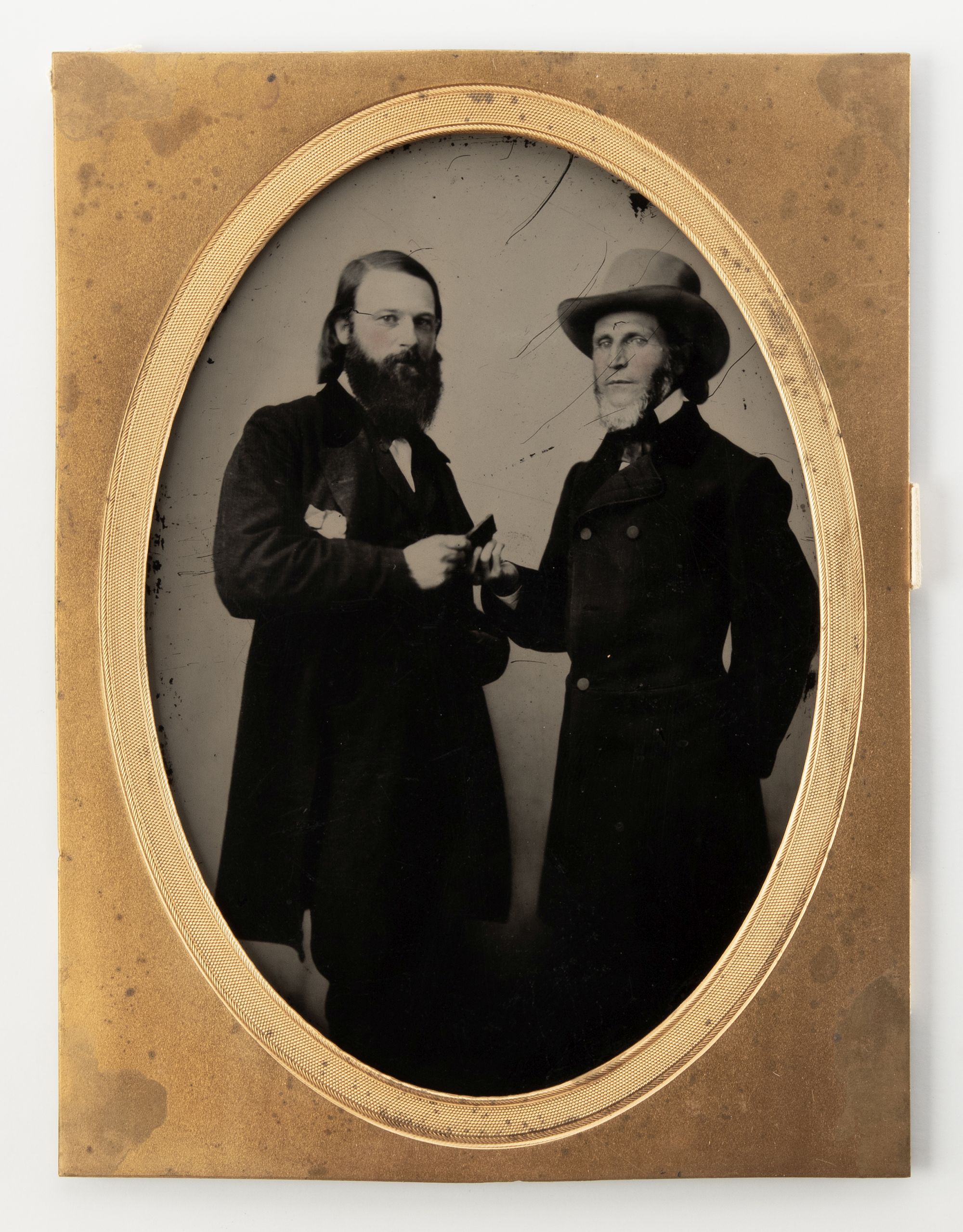 A FULL PLATE AMBROTYPE OF TWO MEN AND PRESENTATION