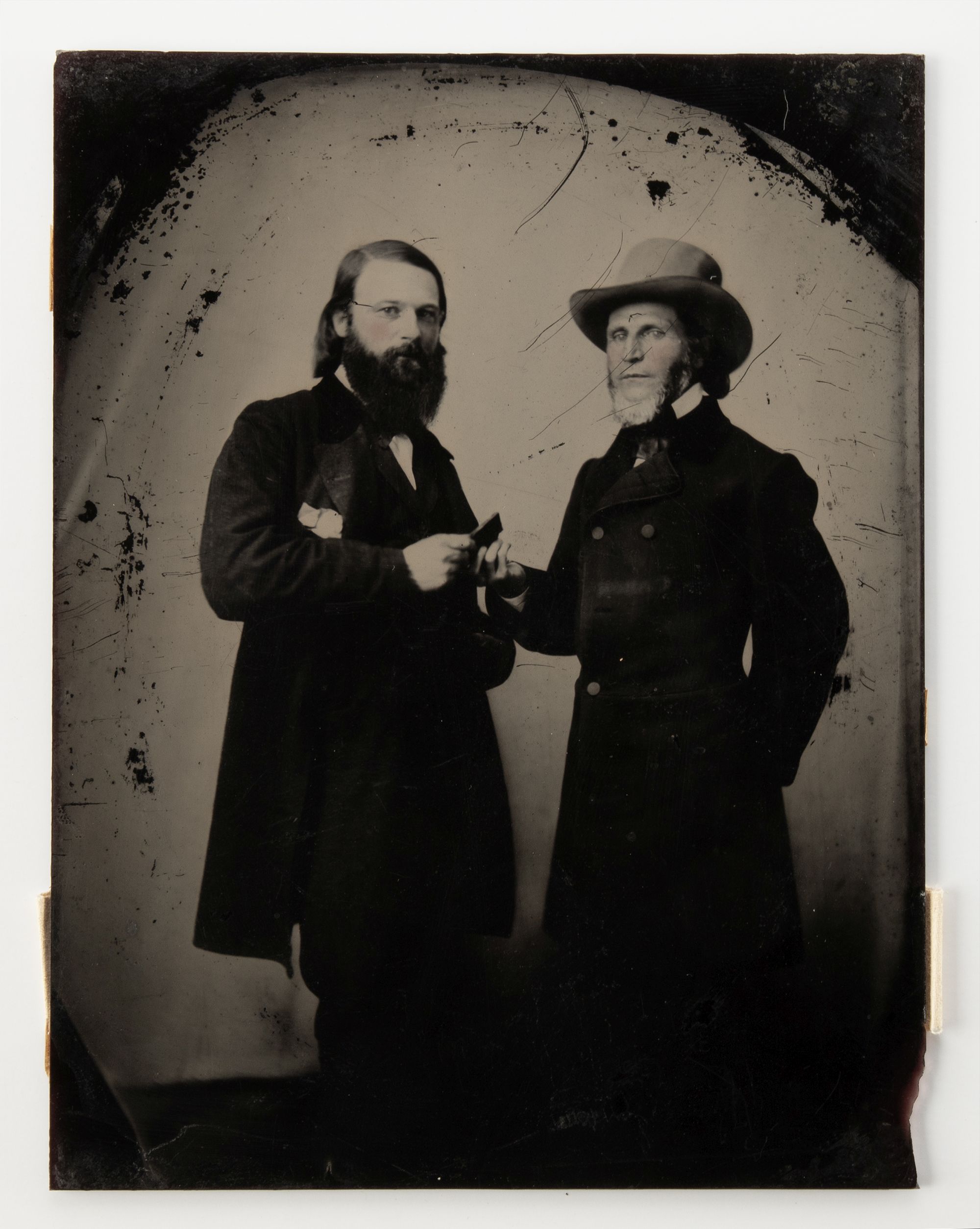 A FULL PLATE AMBROTYPE OF TWO MEN AND PRESENTATION