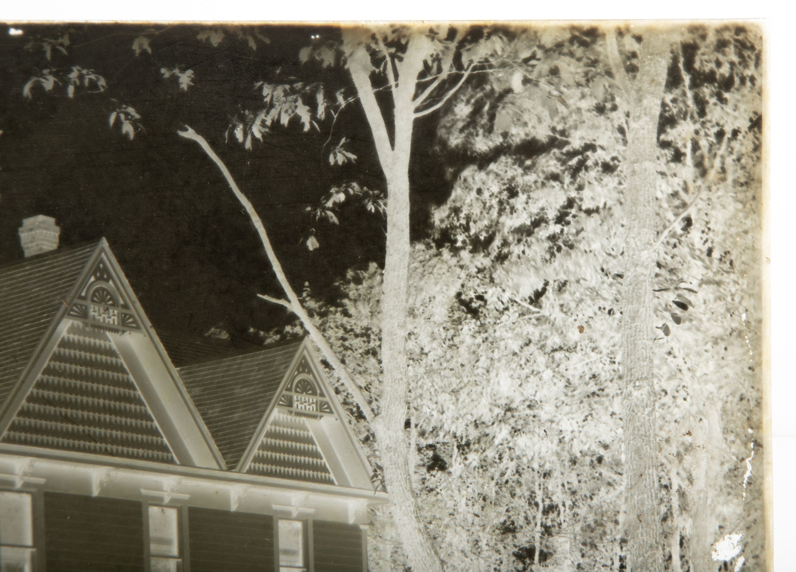 A 19C GLASS PLATE NEGATIVE PICTURING A BASEBALL GAME