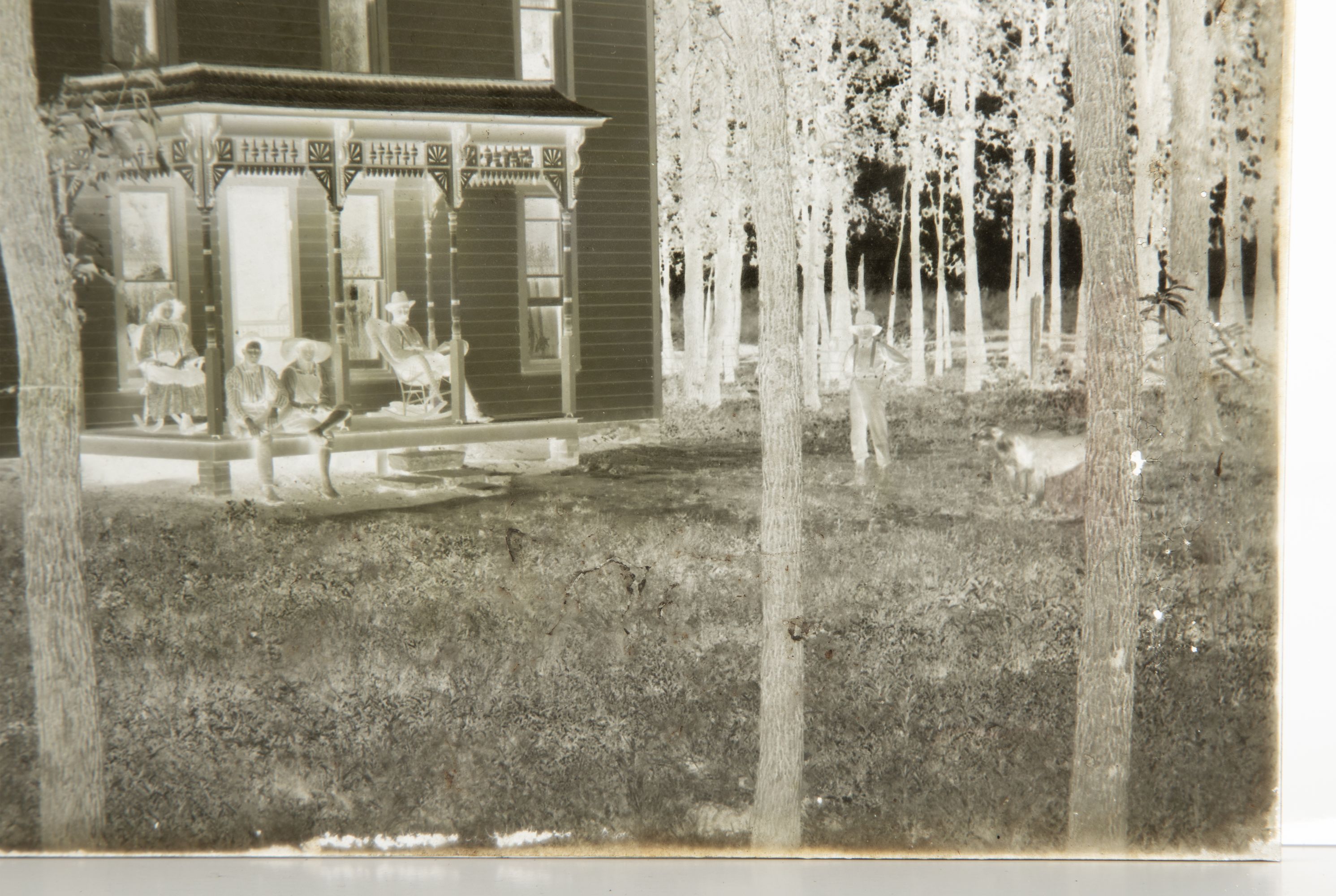 A 19C GLASS PLATE NEGATIVE PICTURING A BASEBALL GAME