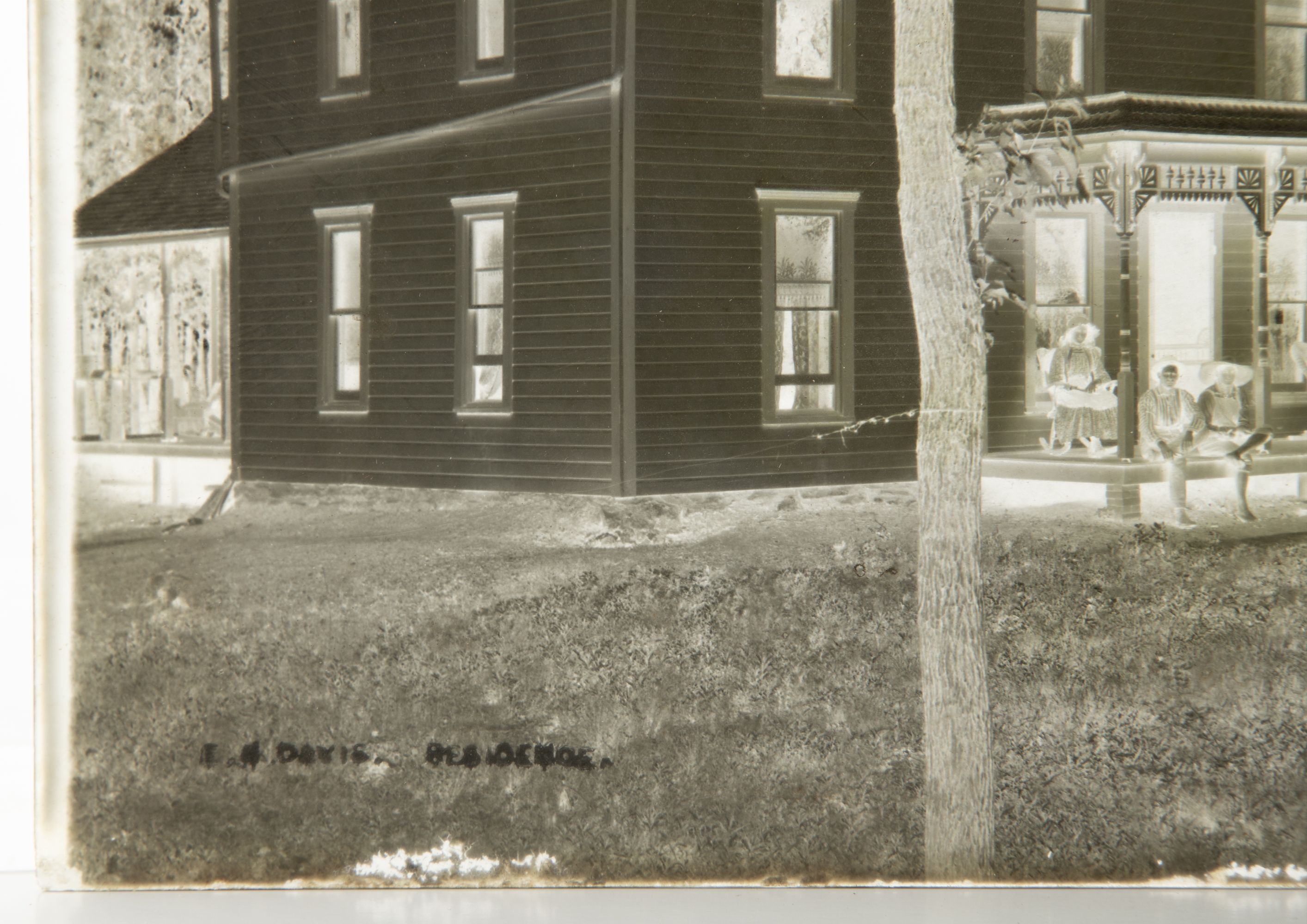 A 19C GLASS PLATE NEGATIVE PICTURING A BASEBALL GAME