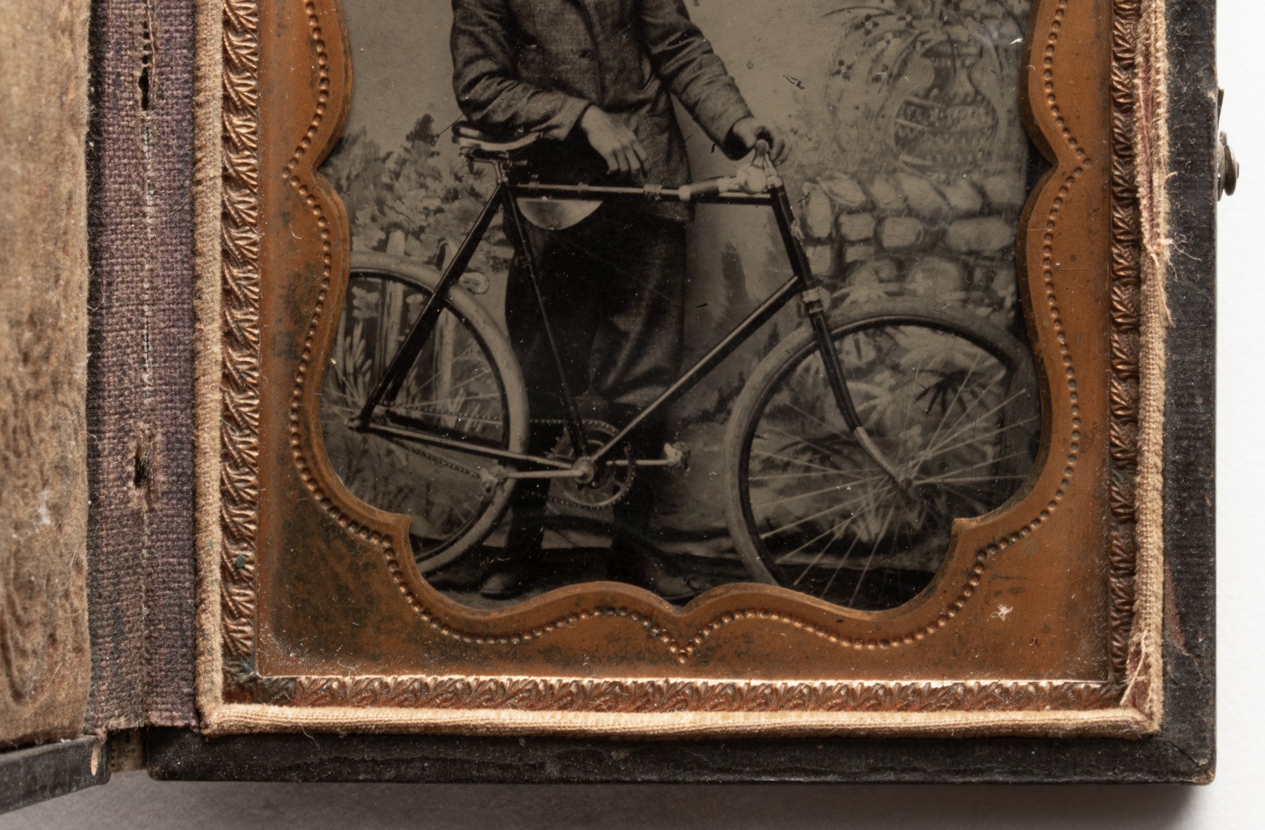 A GOOD TINTYPE PHOTOGRAPH OF GENTLEMAN WITH HIS BICYCLE