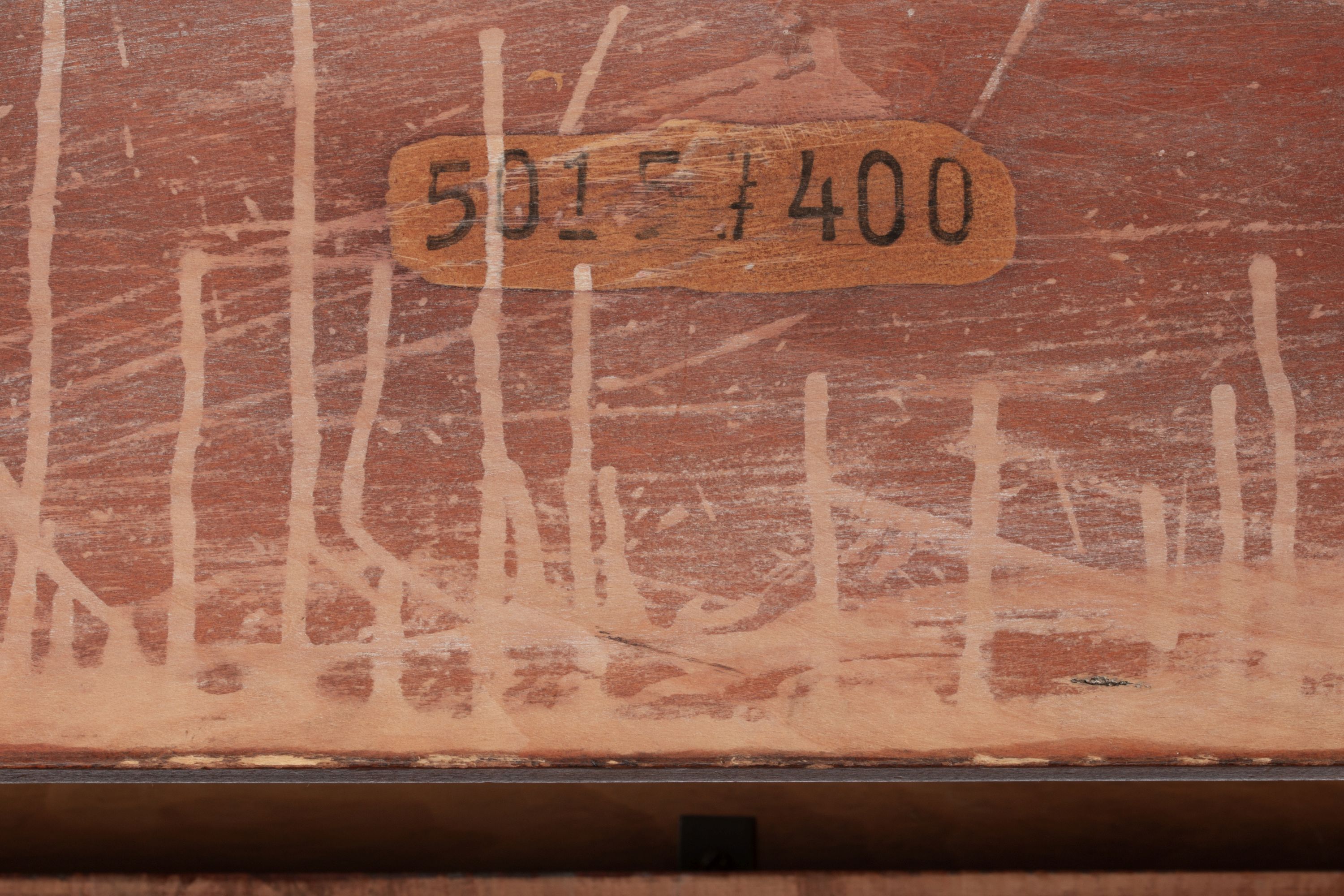 A PAUL FRANKL SIDE TABLE WITH CORK TOP