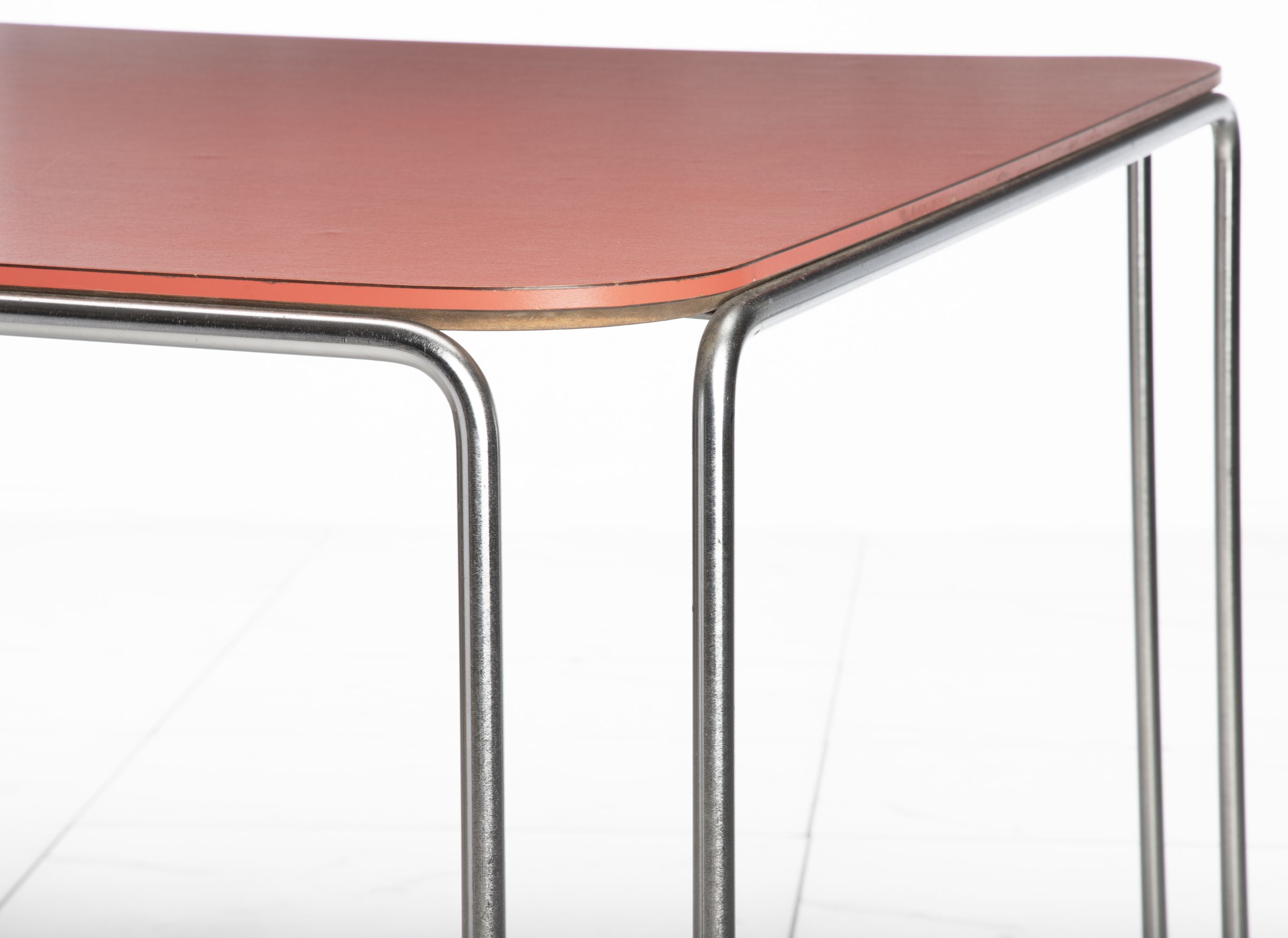 A SCARCE MARCEL BREUER MODEL B10 TABLE WITH RED TOP