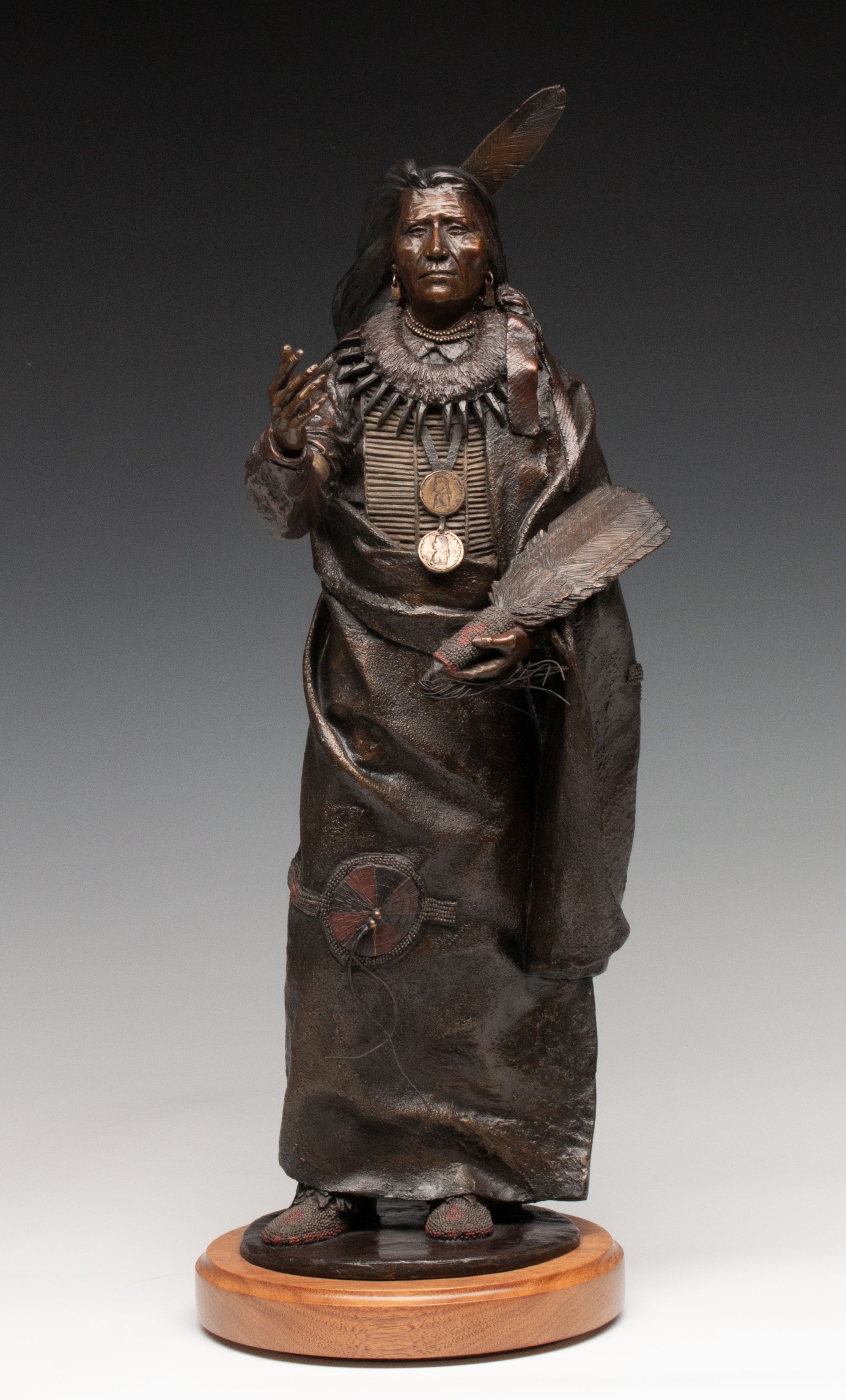 ORELAND JOE (B. 1958) PATINATED AND POLYCHROME BRONZE