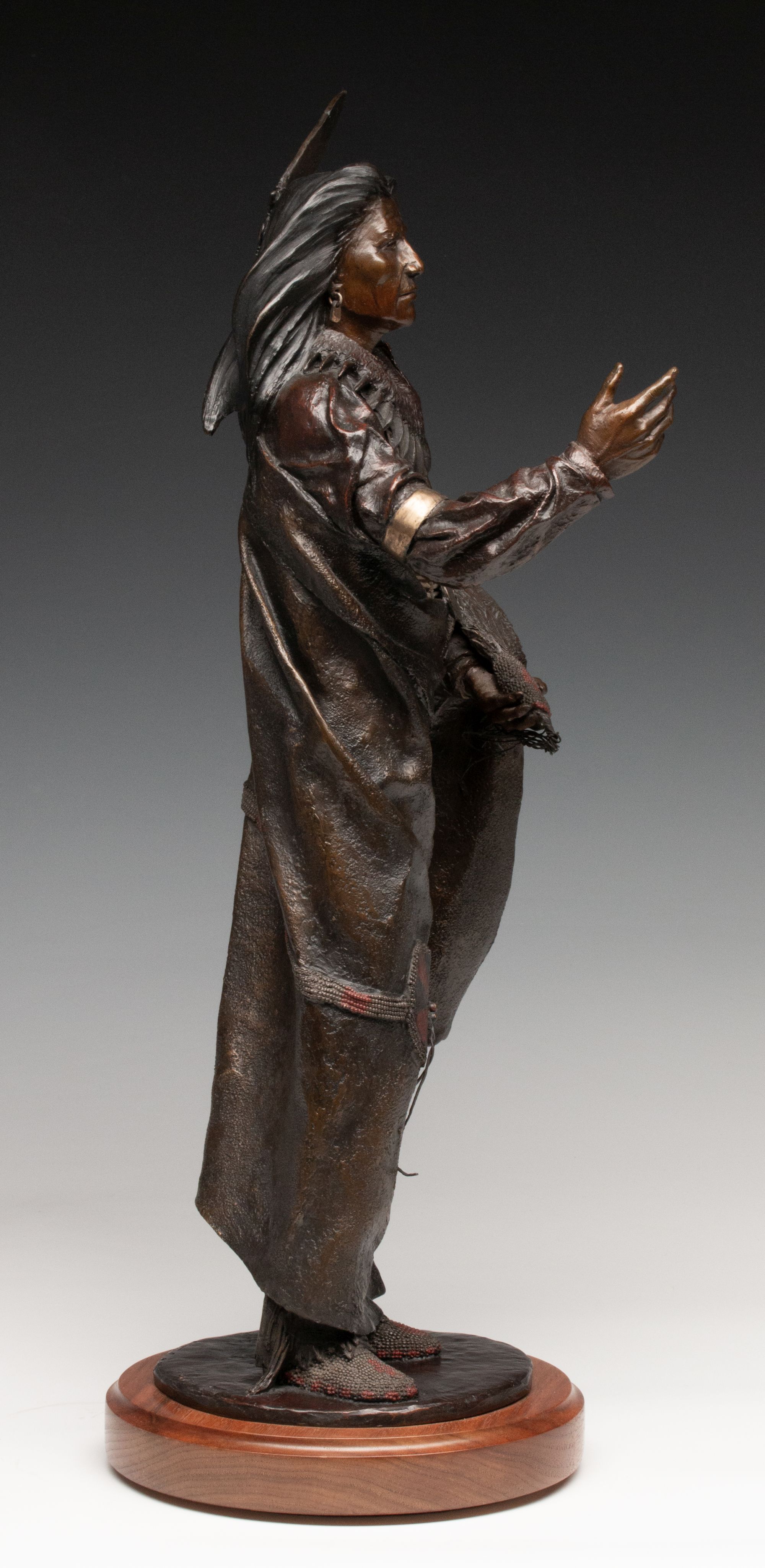 ORELAND JOE (B. 1958) PATINATED AND POLYCHROME BRONZE