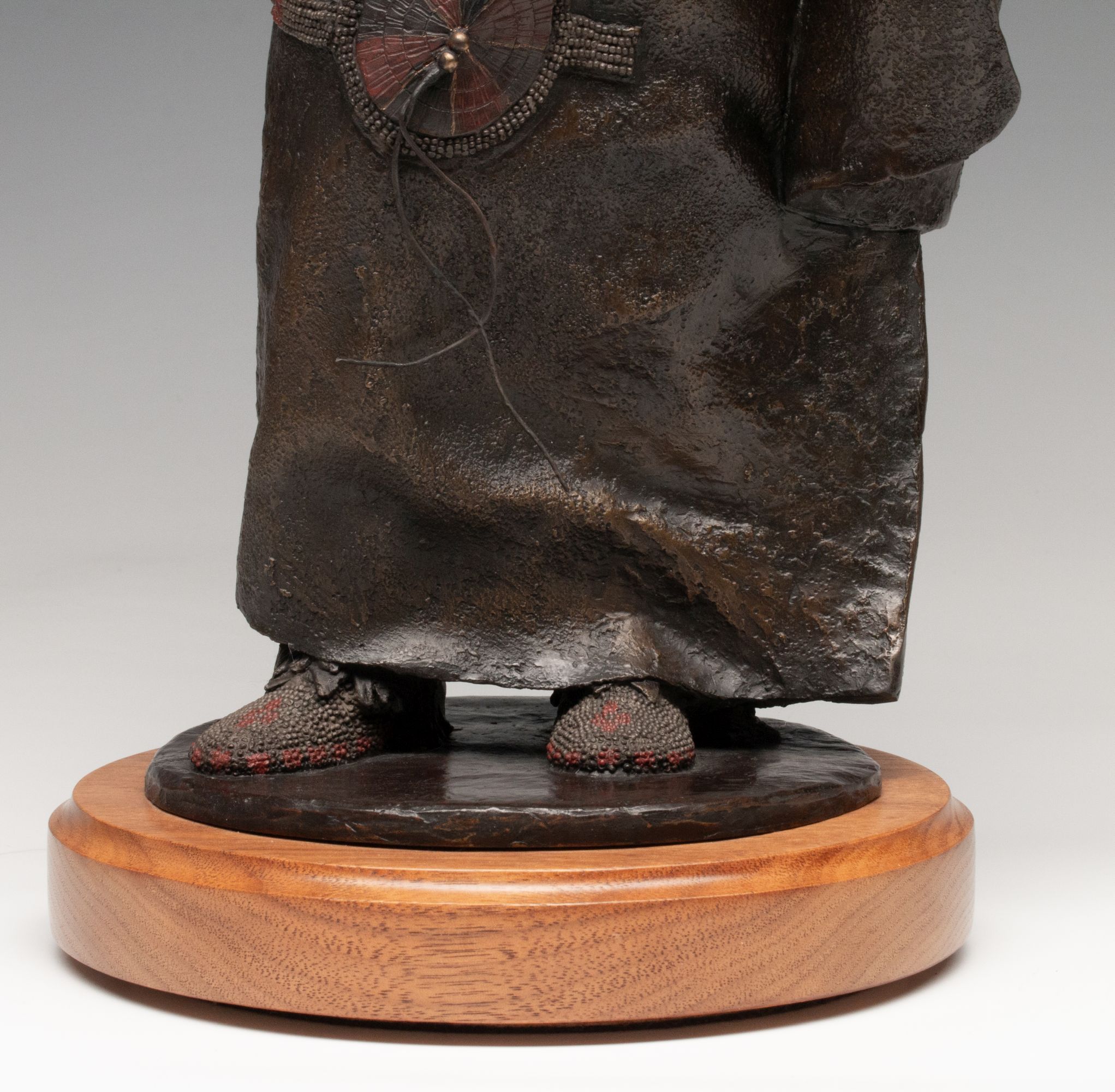 ORELAND JOE (B. 1958) PATINATED AND POLYCHROME BRONZE