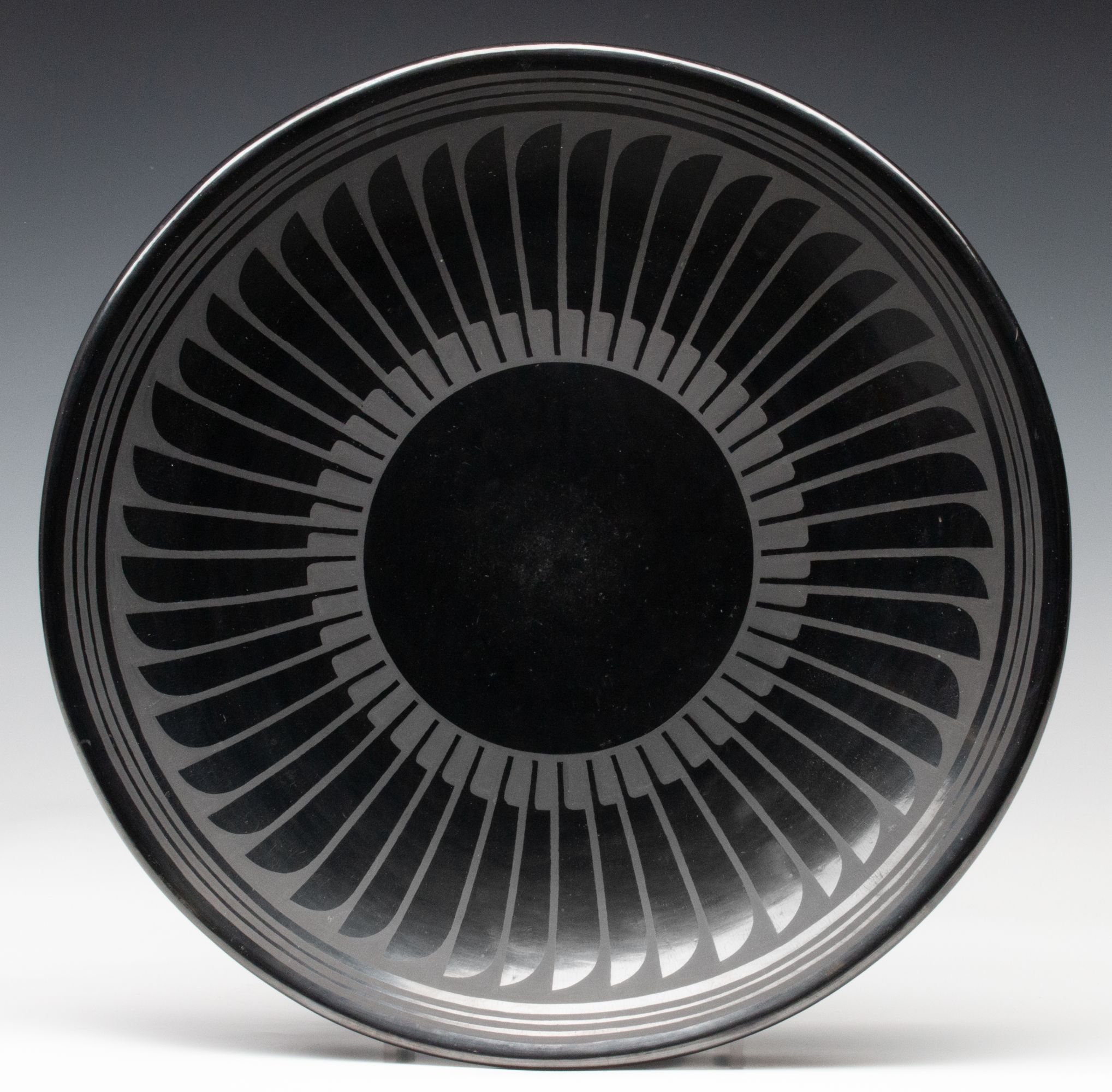 MARIA MARTINEZ (1887-1980) POLISHED PLATE WITH FEATHERS