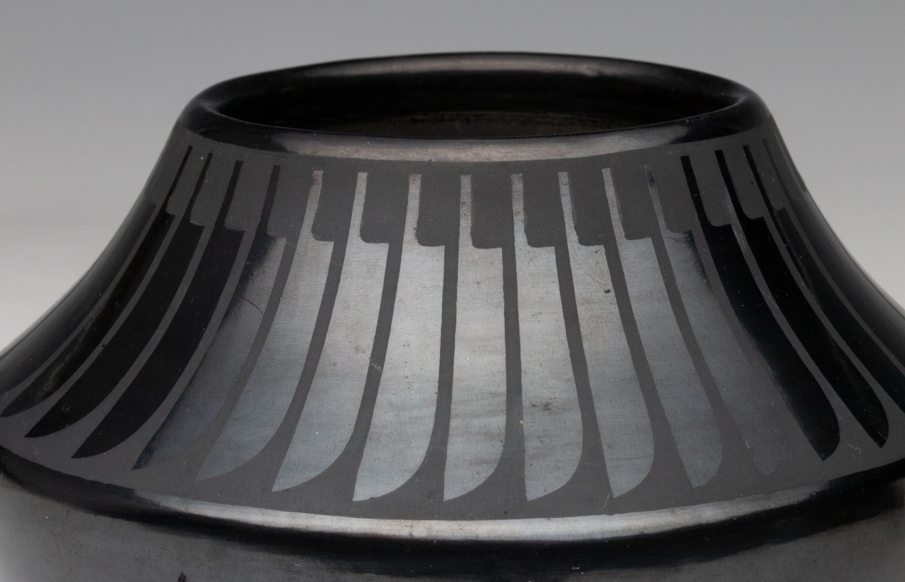 MARIA MARTINEZ (1887-1980) POLISHED JAR WITH FEATHERS