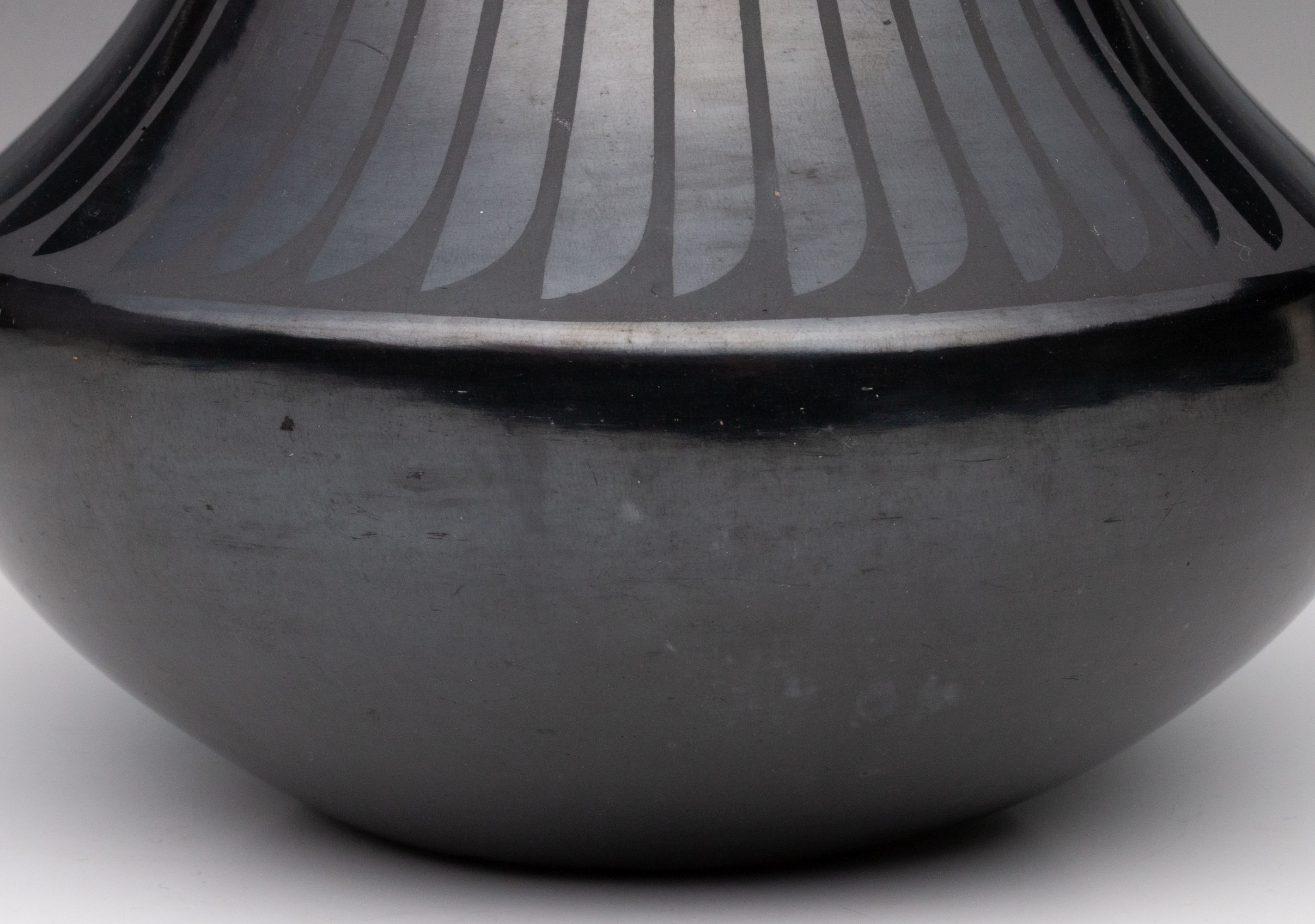 MARIA MARTINEZ (1887-1980) POLISHED JAR WITH FEATHERS