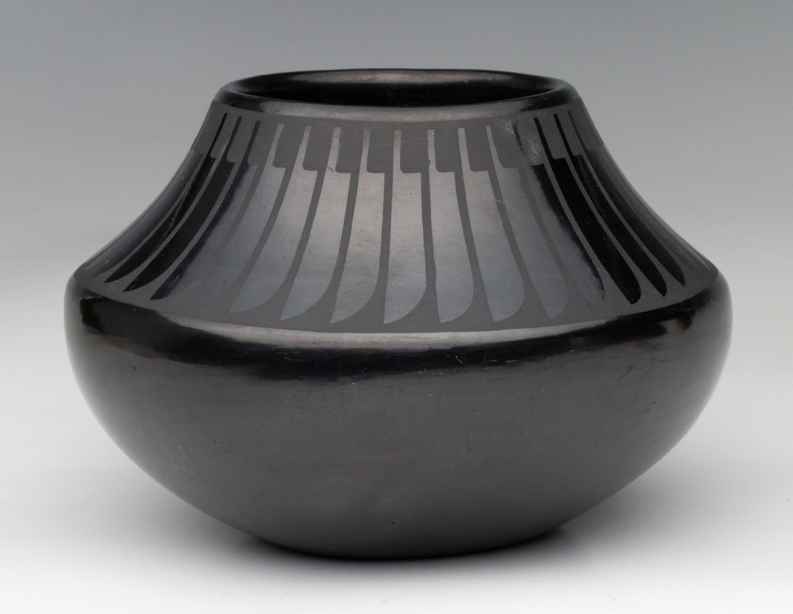 MARIA MARTINEZ (1887-1980) POLISHED JAR WITH FEATHERS