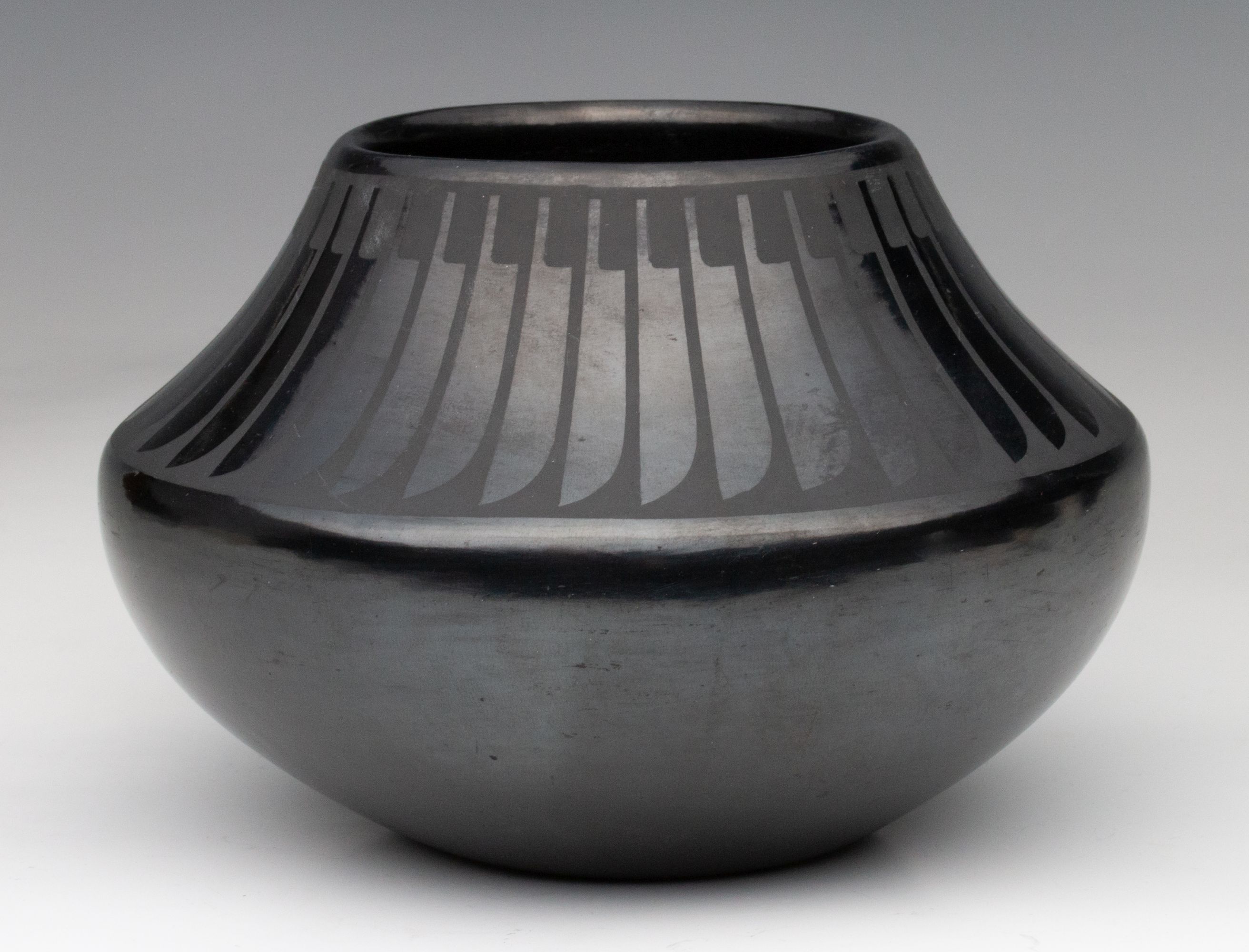 MARIA MARTINEZ (1887-1980) POLISHED JAR WITH FEATHERS