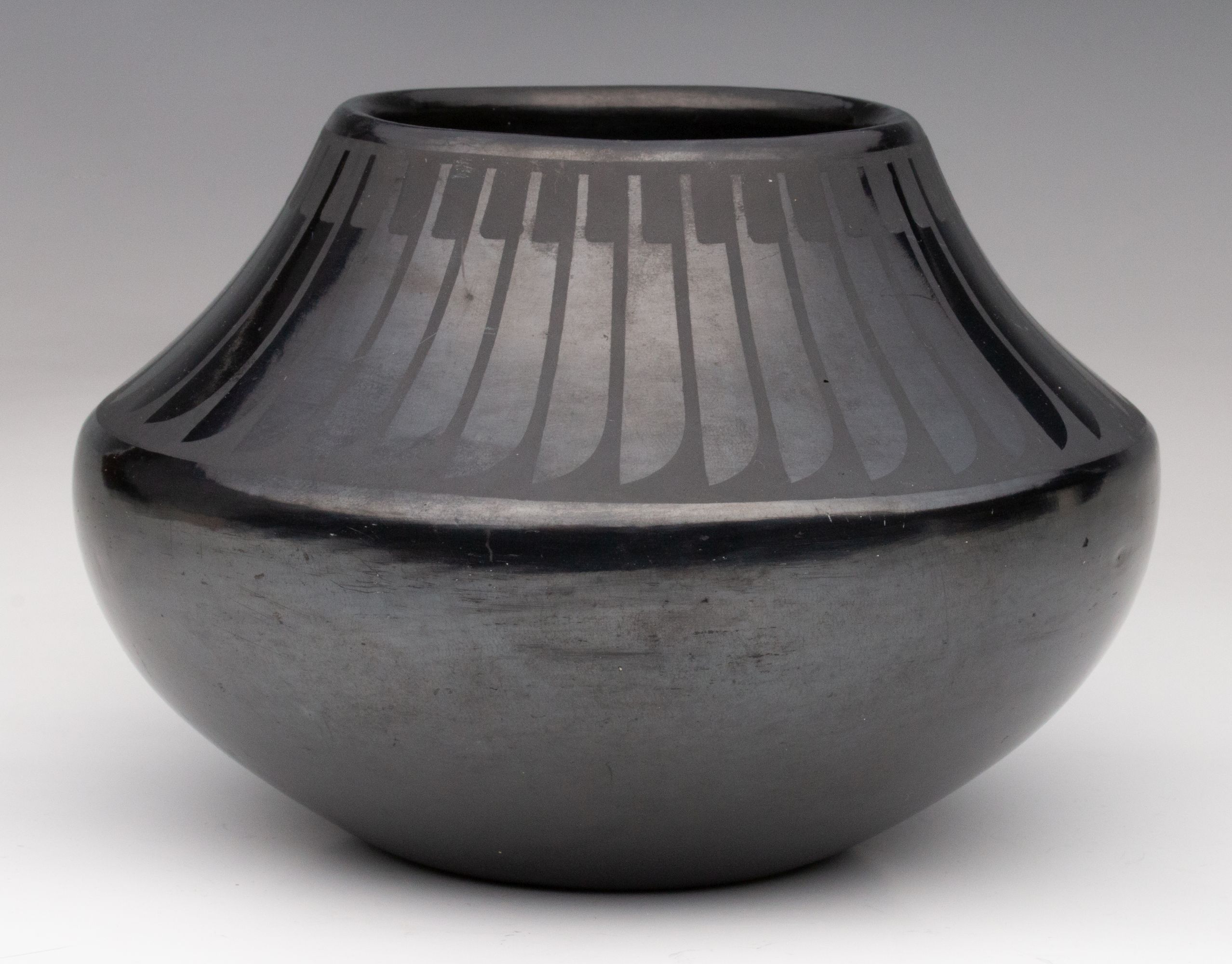 MARIA MARTINEZ (1887-1980) POLISHED JAR WITH FEATHERS