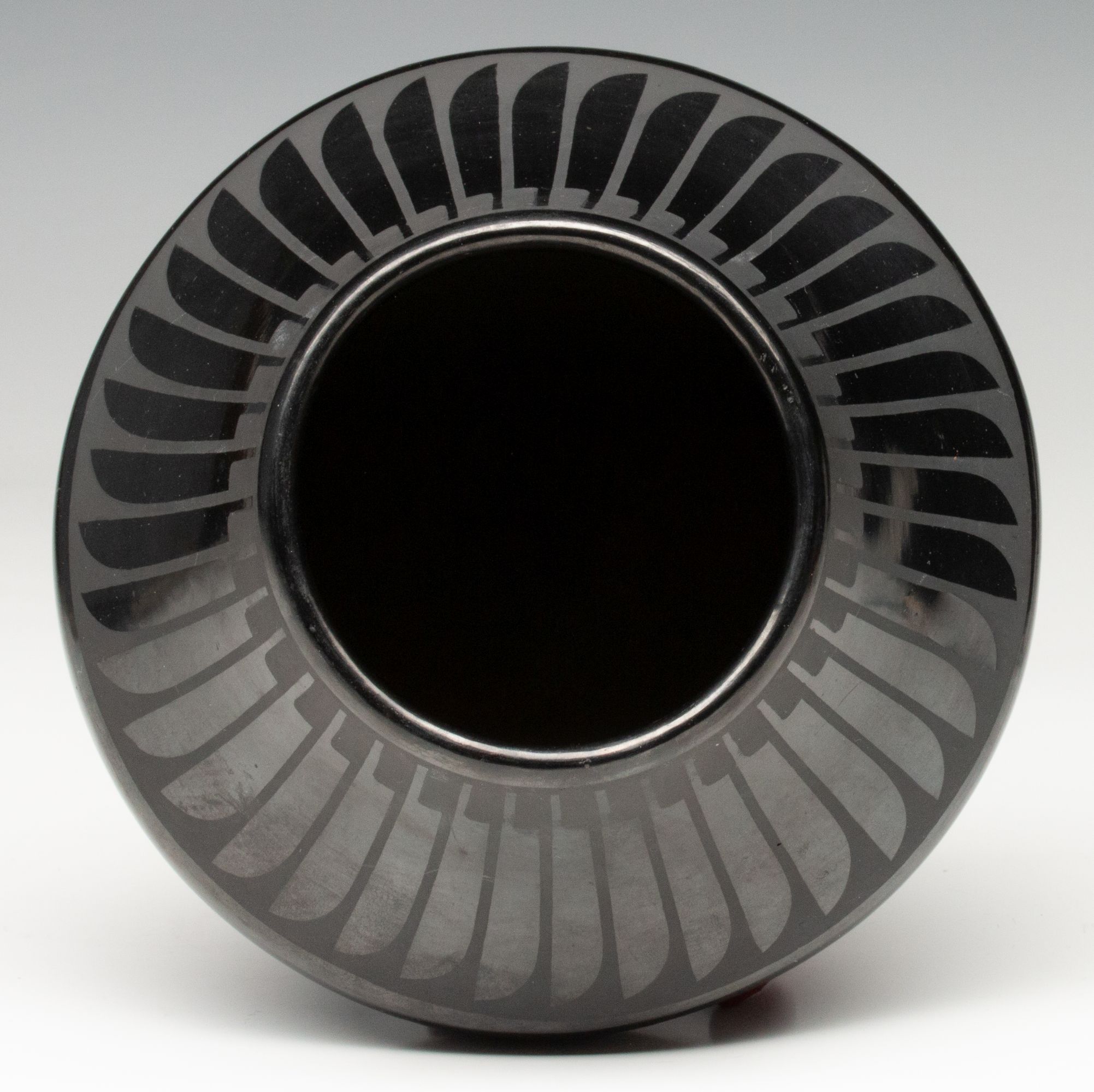 MARIA MARTINEZ (1887-1980) POLISHED JAR WITH FEATHERS
