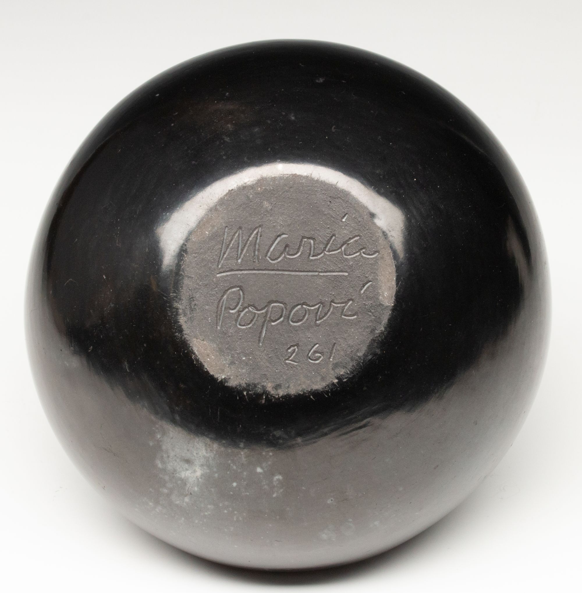 MARIA MARTINEZ (1887-1980) POLISHED JAR WITH FEATHERS