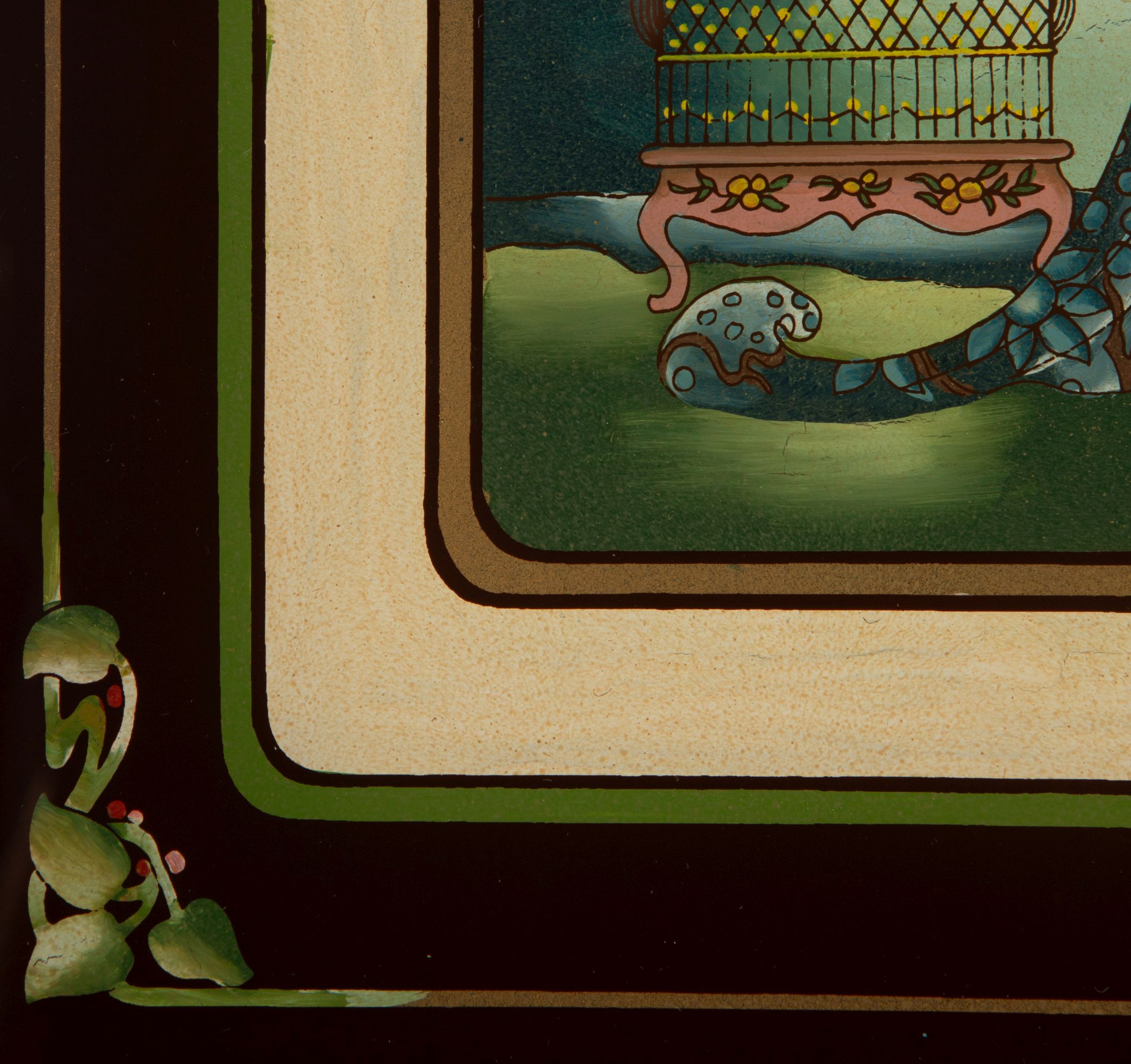 AN IMAGE AFTER ERTE PRINTED IN REVERSE ON GLASS