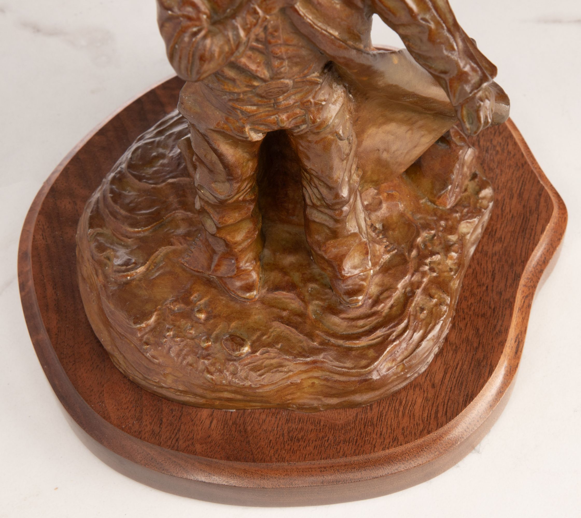 HAROLD T. HOLDEN (B. 1940) COWBOY BRONZE SCULPTURE