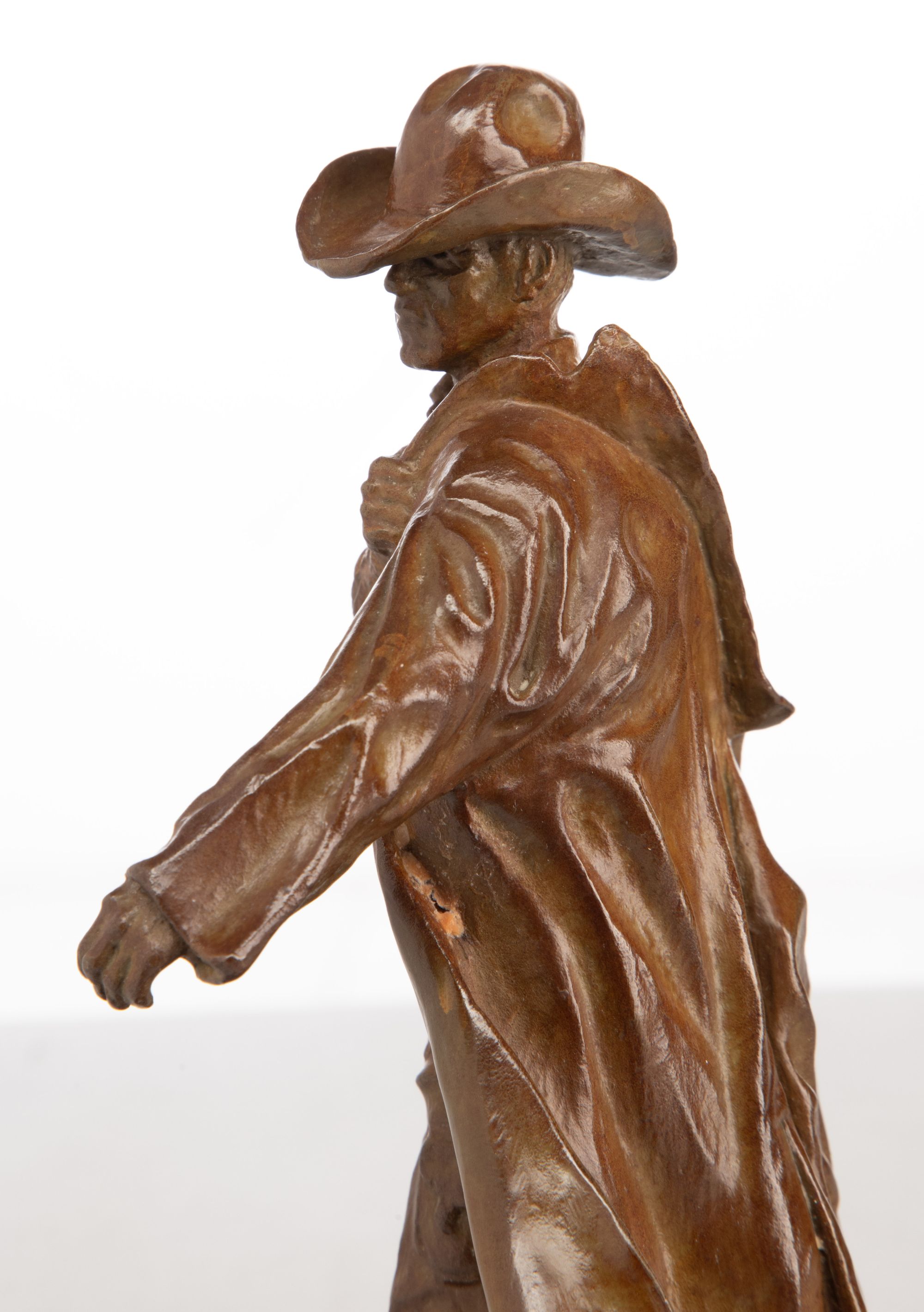HAROLD T. HOLDEN (B. 1940) COWBOY BRONZE SCULPTURE