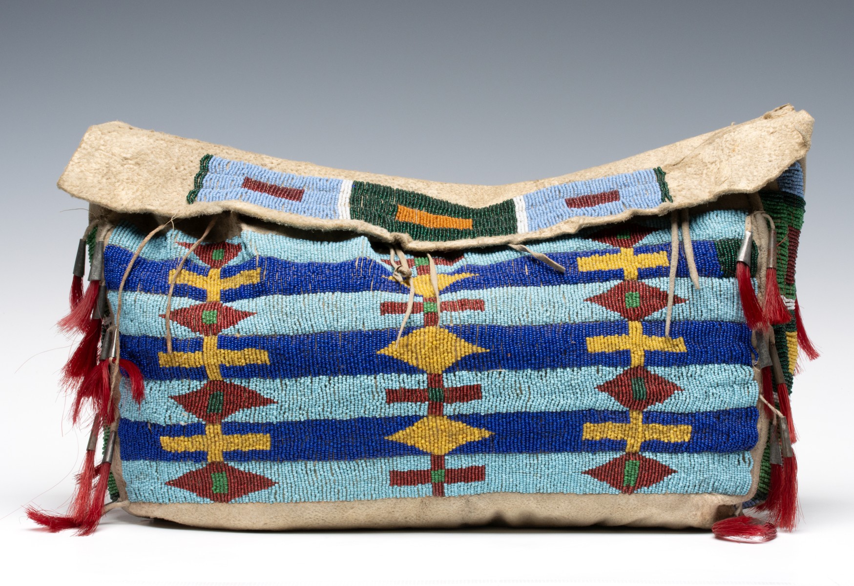 A LATE 19TH CENTURY NORTHERN PLAINS BEADED POSSIBLE BAG