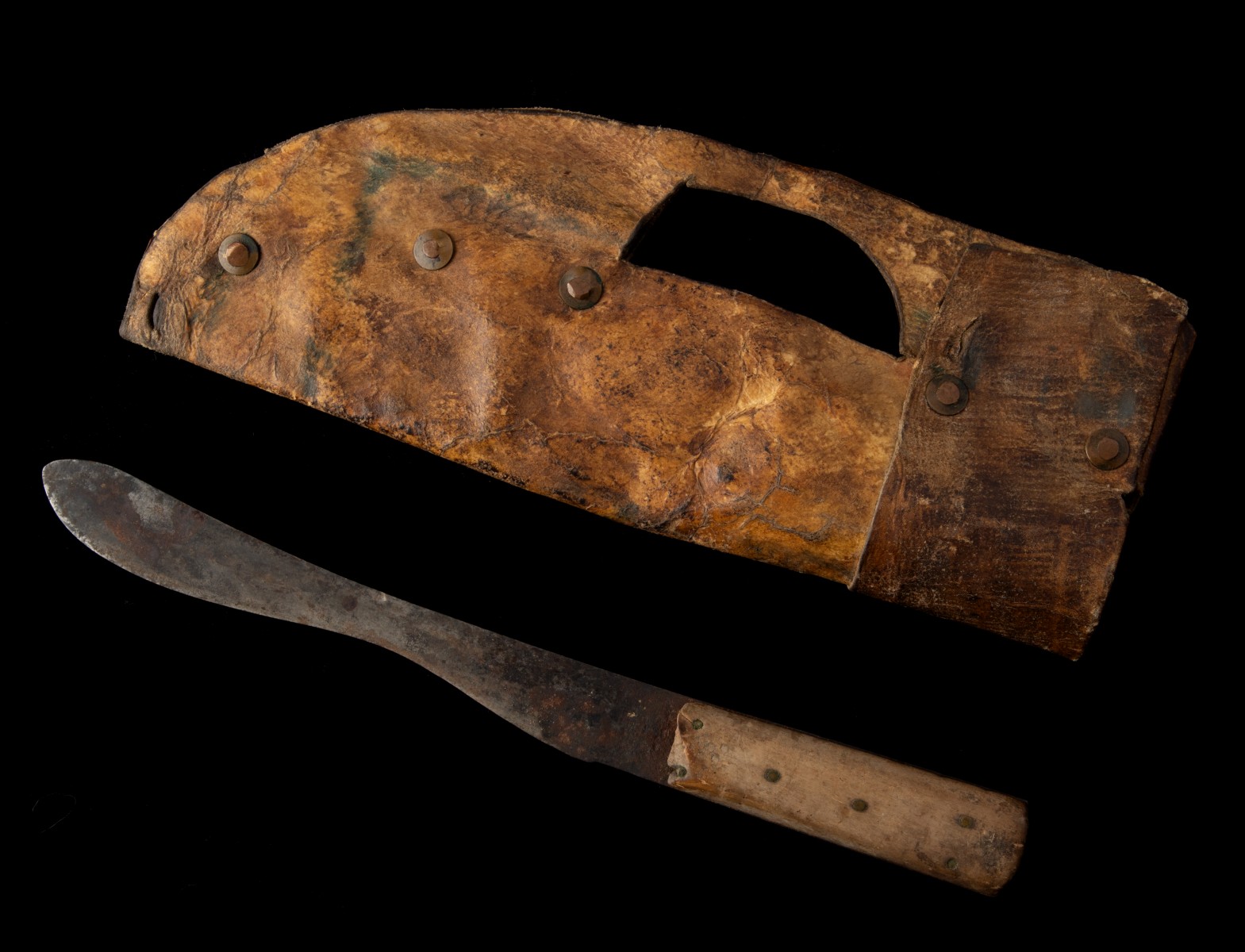 AN INTERESTING BISON HIDE PARFLECHE KNIFE SHEATH