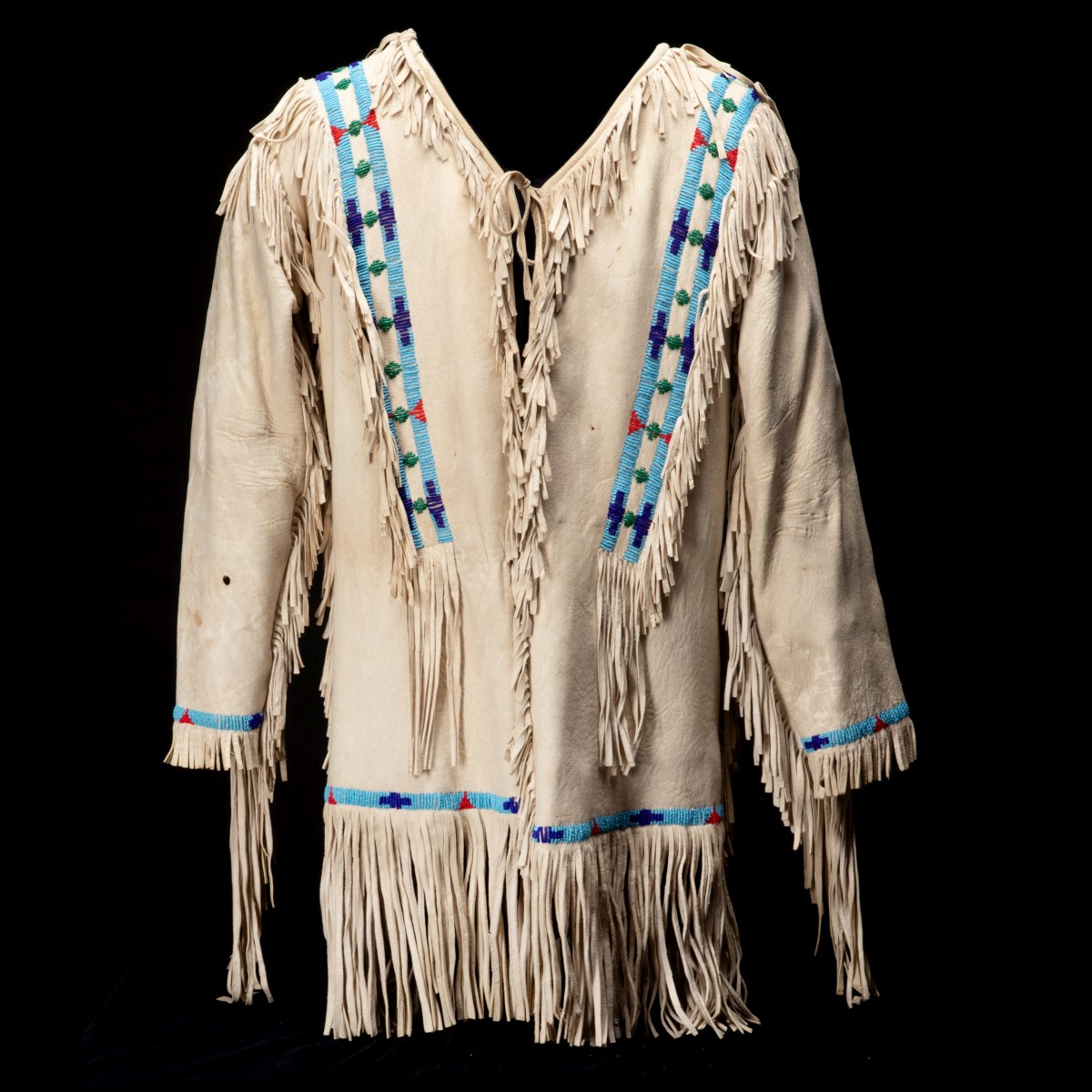 A POWWOW BEADED HIDE SCOUT'S COAT