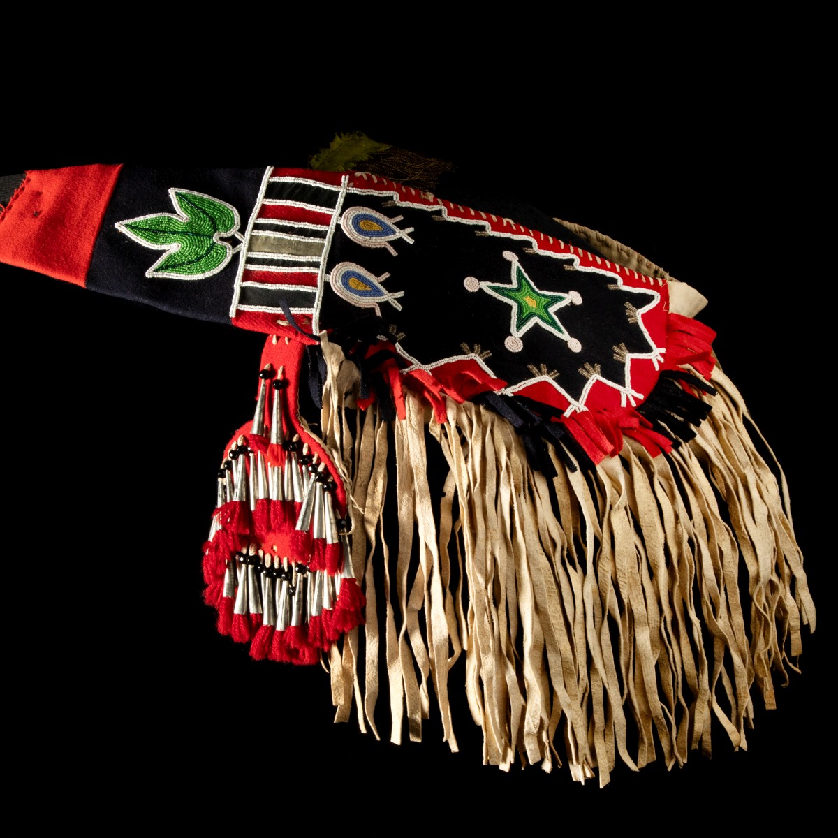 AN ELABORATE BEADED BLACKFEET HORSE CRUPPER CIRCA 1910