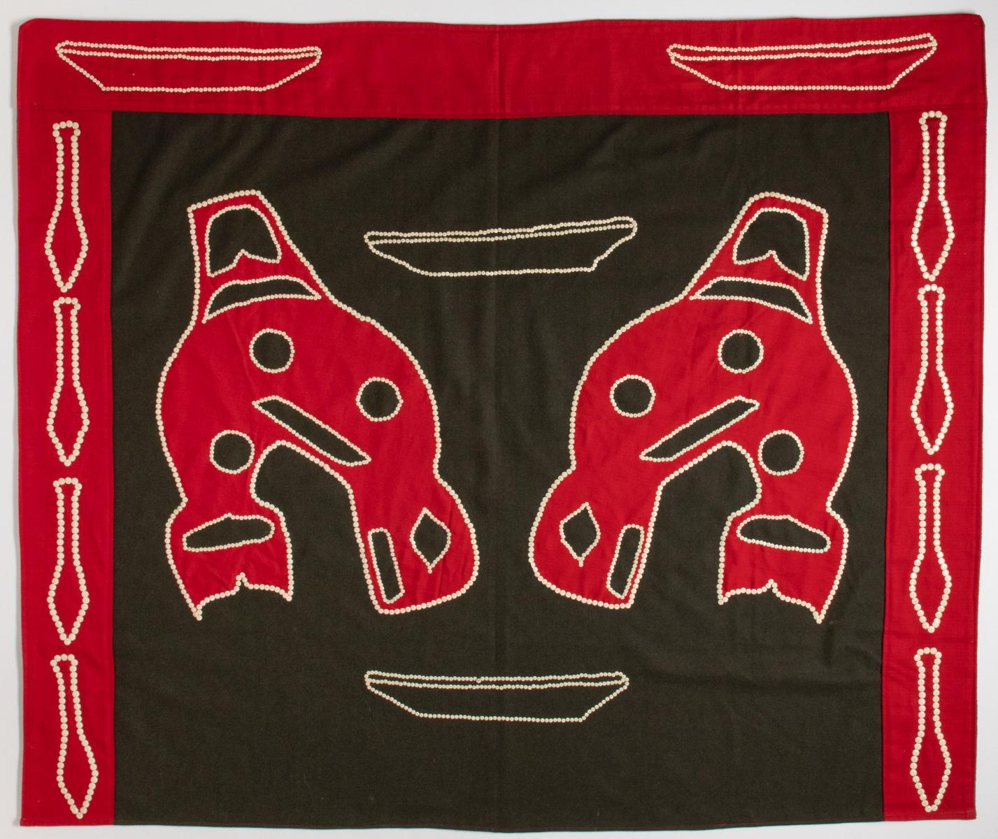 AN EARLY 20TH CENTURY NORTHWEST COAST BUTTON BLANKET