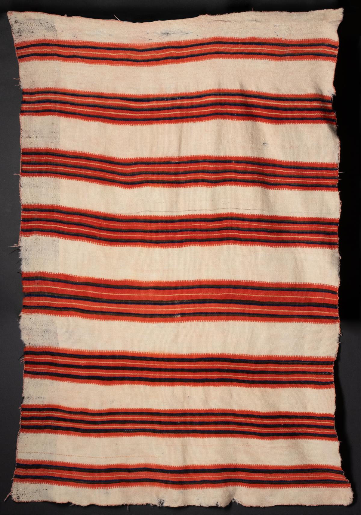 A 19TH CENTURY PUEBLO OR NAVAJO BANDED BLANKET