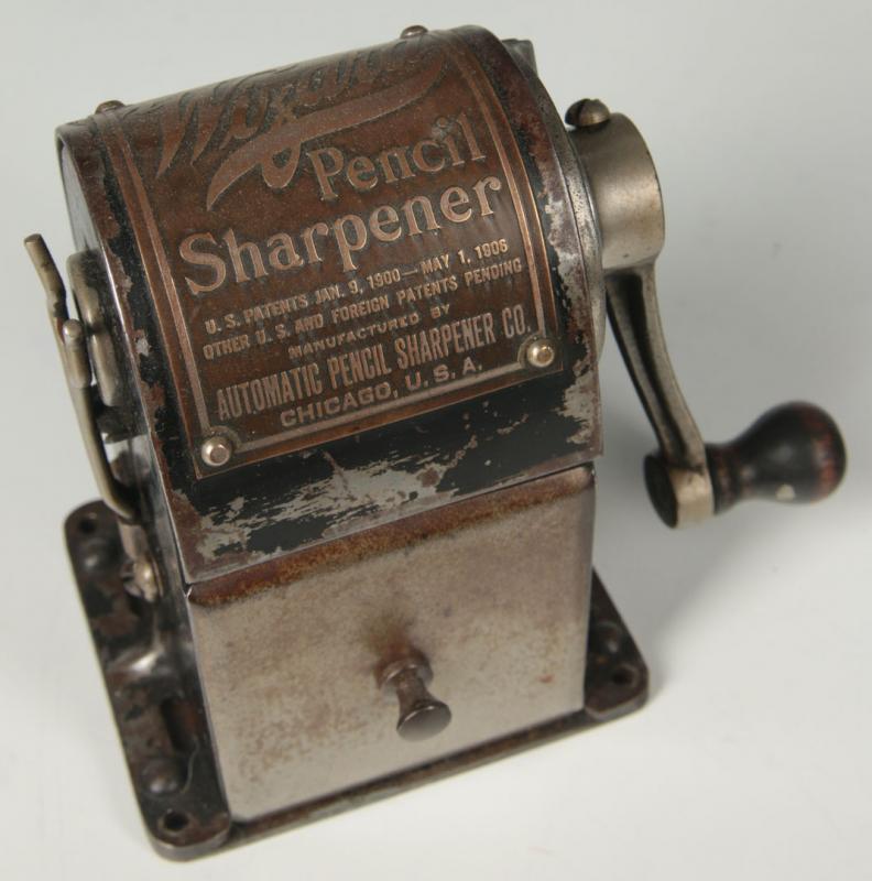 C. 1914 'WIZARD' ANTIQUE HAND CRANK PENCIL SHARPENER